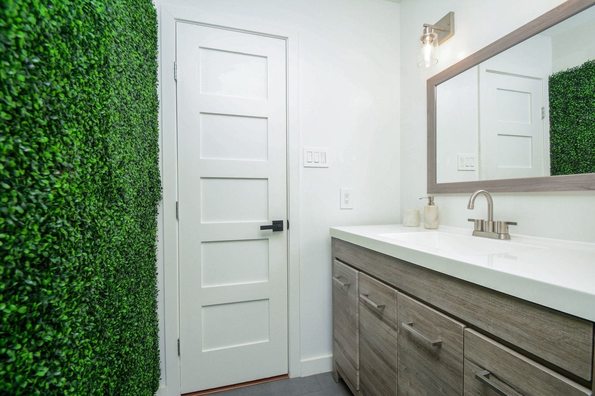 Beautifully remodeled bathroom featuring modern vanity, updated fixtures, and contemporary finishes.
