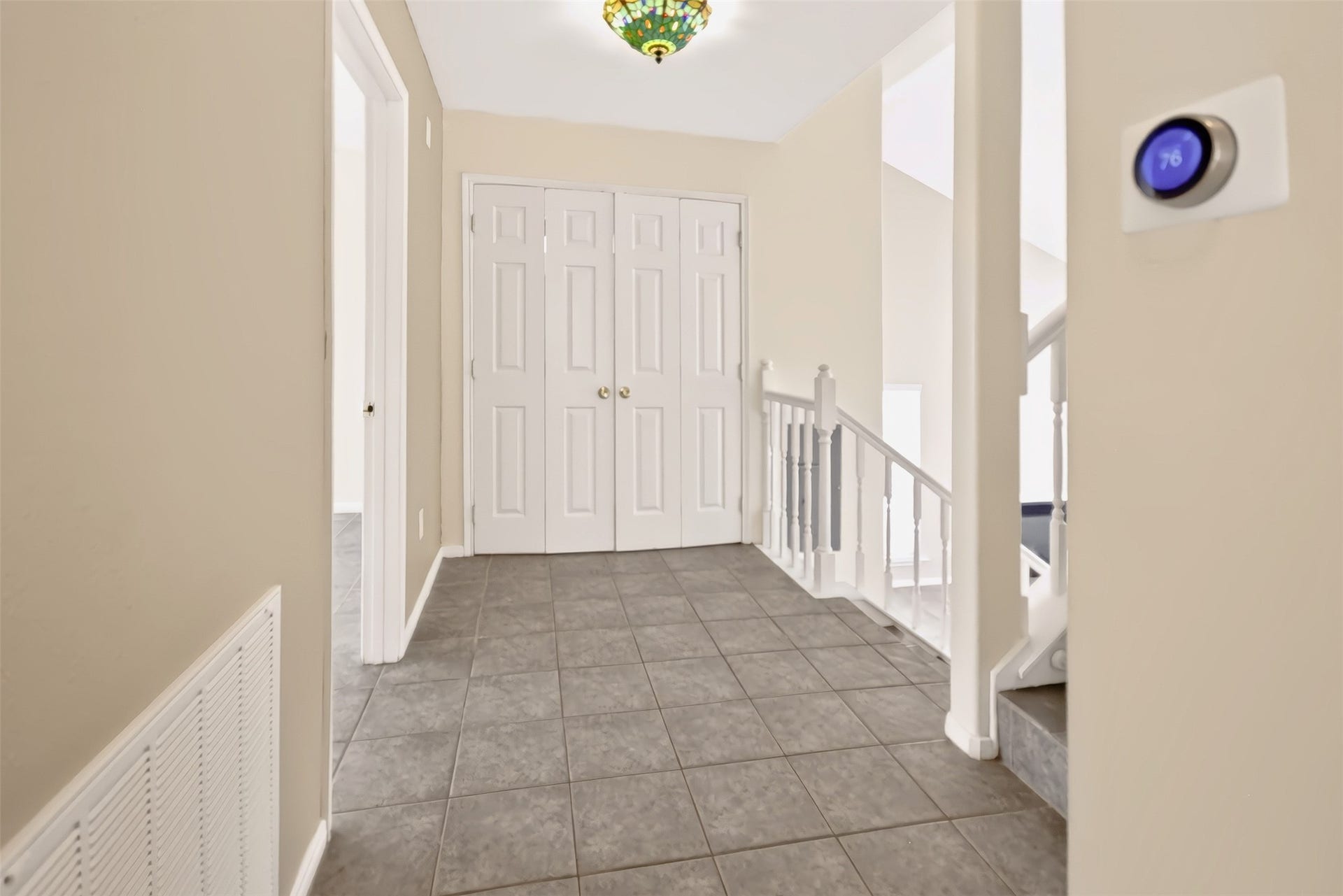 1144 Sailfish Street, Bayou Vista, TX 77563 HALL AREA AND THE LAUNDRY AREA AT DOUBLE DOORS FOR EASY ACCESS. NEST THERMOSTAT