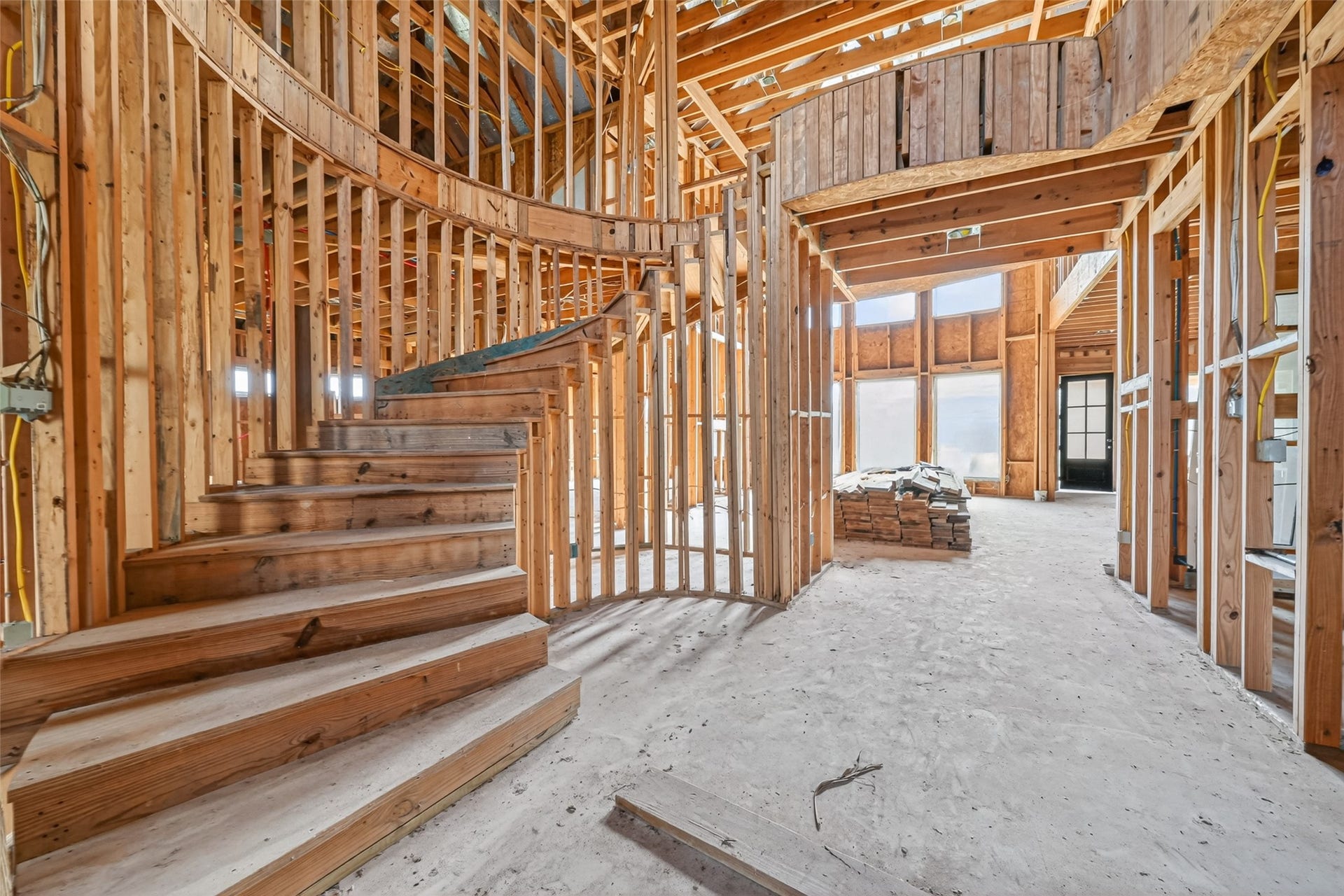 8023 Pool Hill Road, Fulshear, TX 77441 Open unfinished space showcasing framing and build progress.