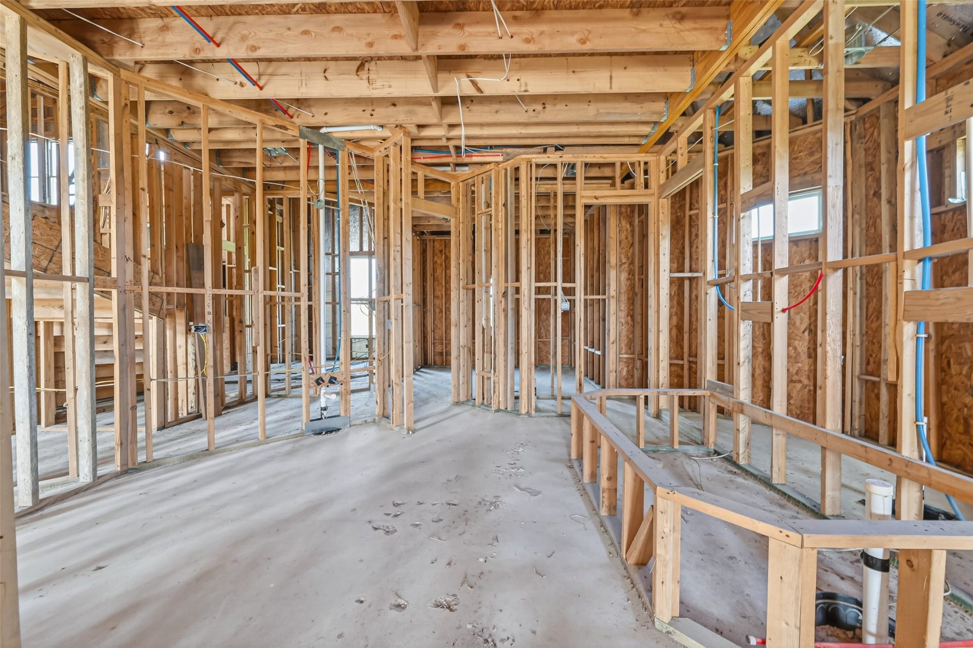 8023 Pool Hill Road, Fulshear, TX 77441 Open unfinished space showcasing framing and build progress.