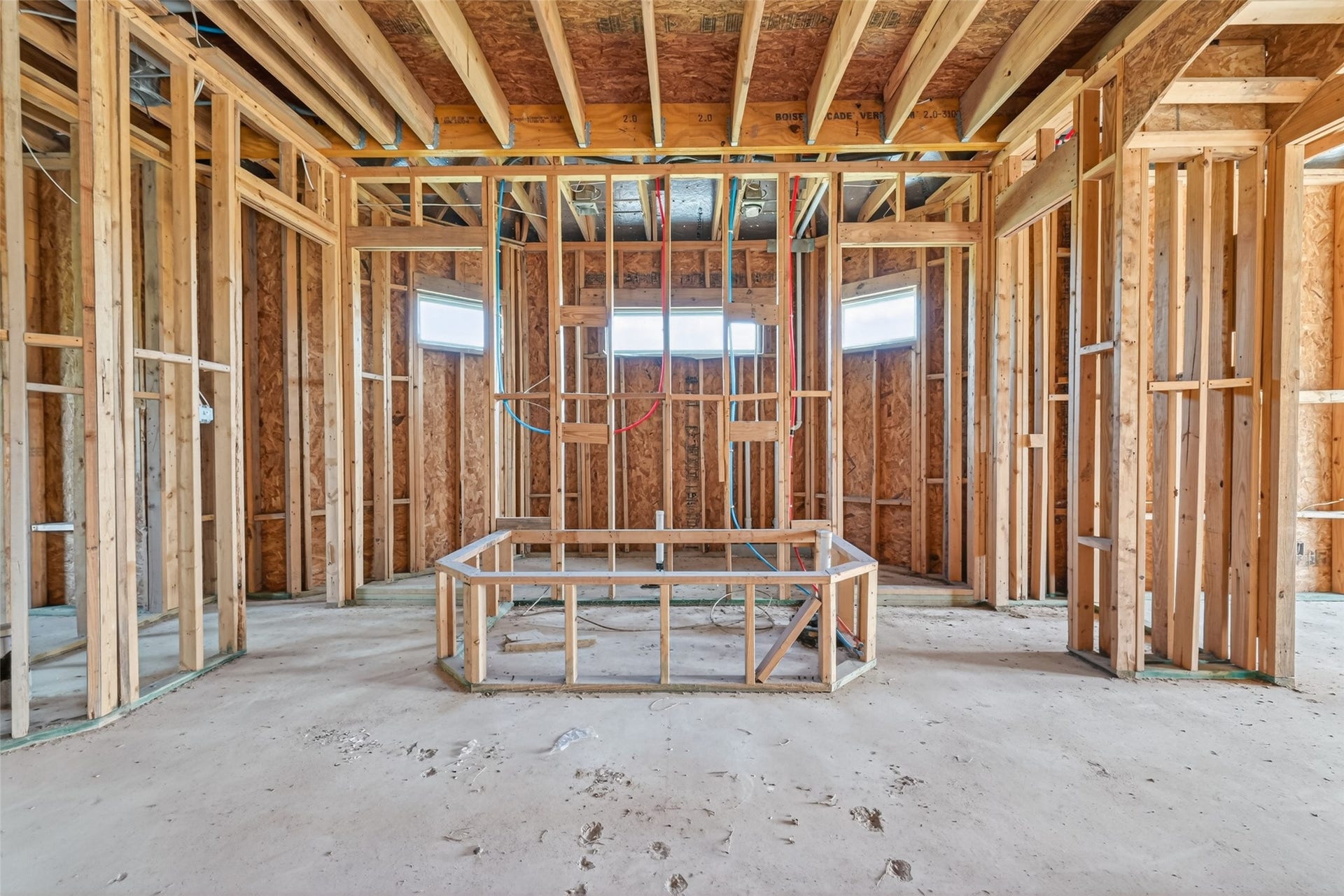 8023 Pool Hill Road, Fulshear, TX 77441 Open unfinished space showcasing framing and build progress.