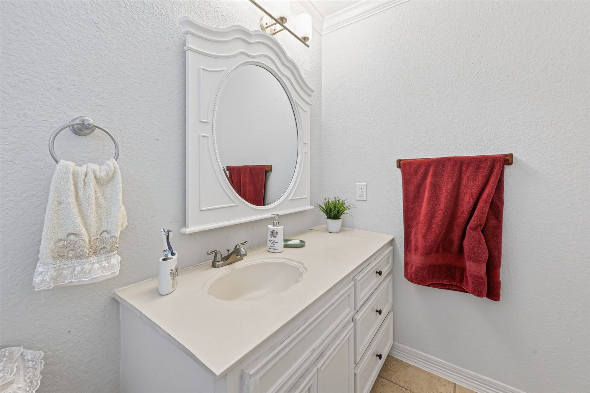 8023 Pool Hill Road, Fulshear, TX 77441 Alternate view of second-level bath featuring vanity, framed mirror, and neutral finishes.