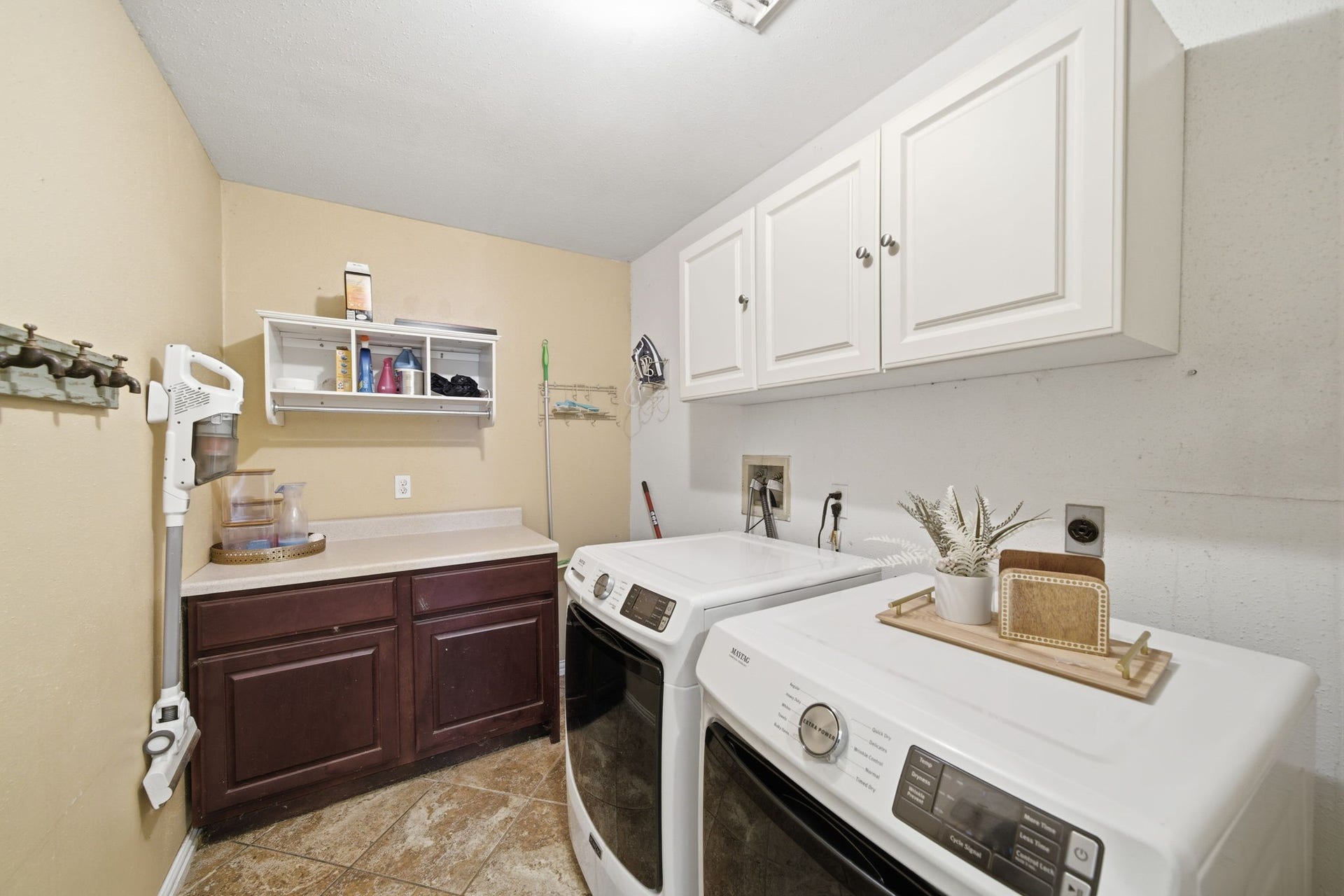 Utility room is located inside the house