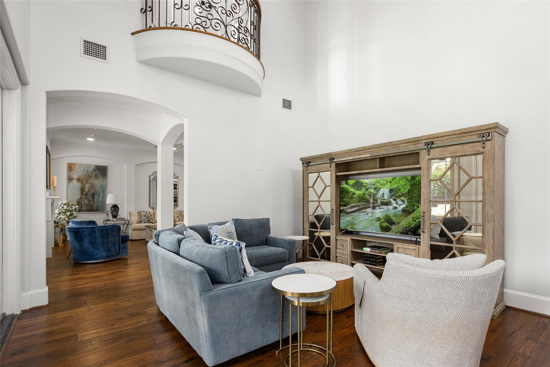 330 E Gaywood Drive, Houston, TX 77079 The Family room and Kitchen have a Juliet Balcony overhead, accessible from the Game Room. The Formal Living room is just past the Family room.