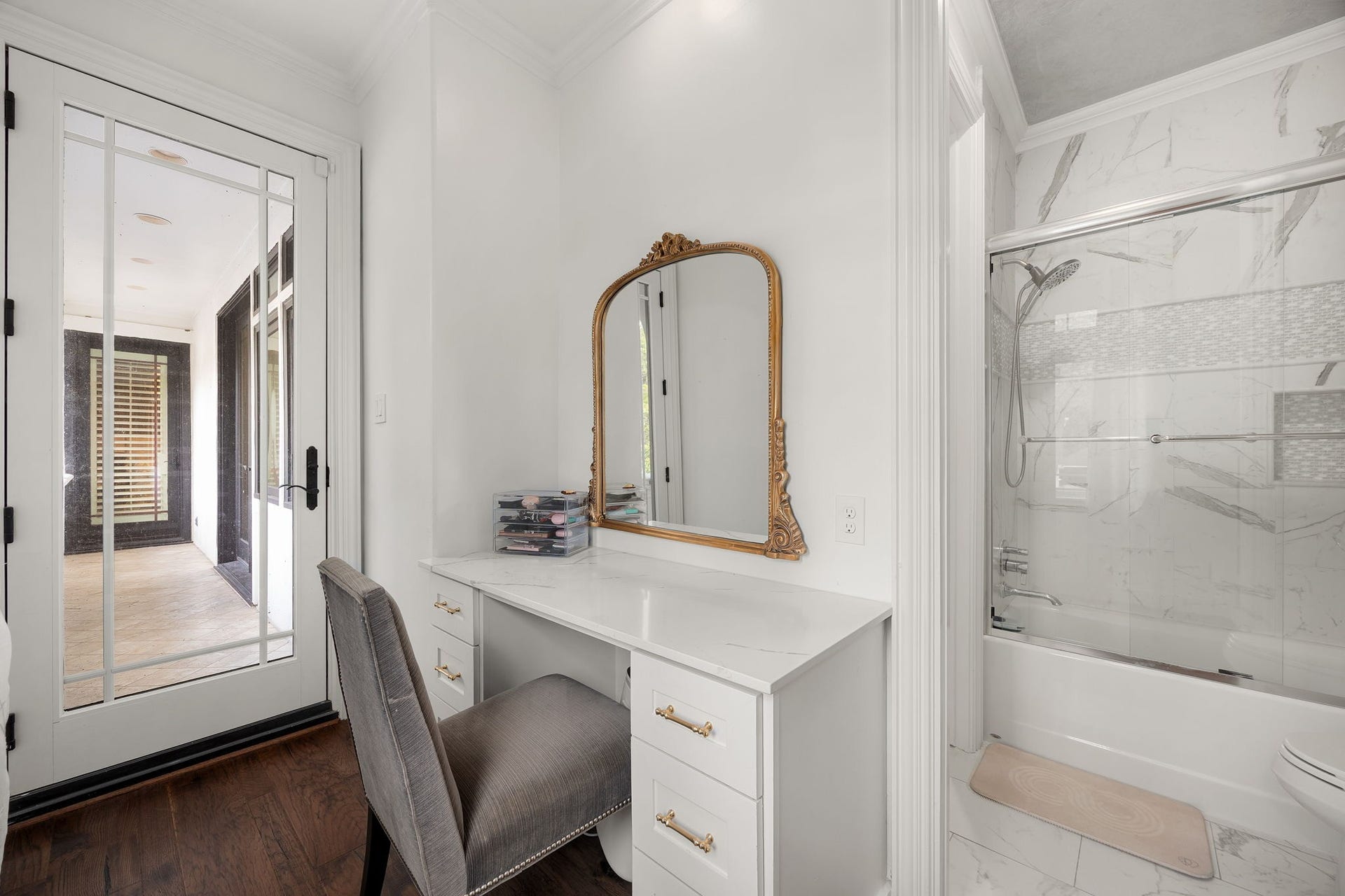 330 E Gaywood Drive, Houston, TX 77079 Vanity area with balcony access and a tub/shower combo.