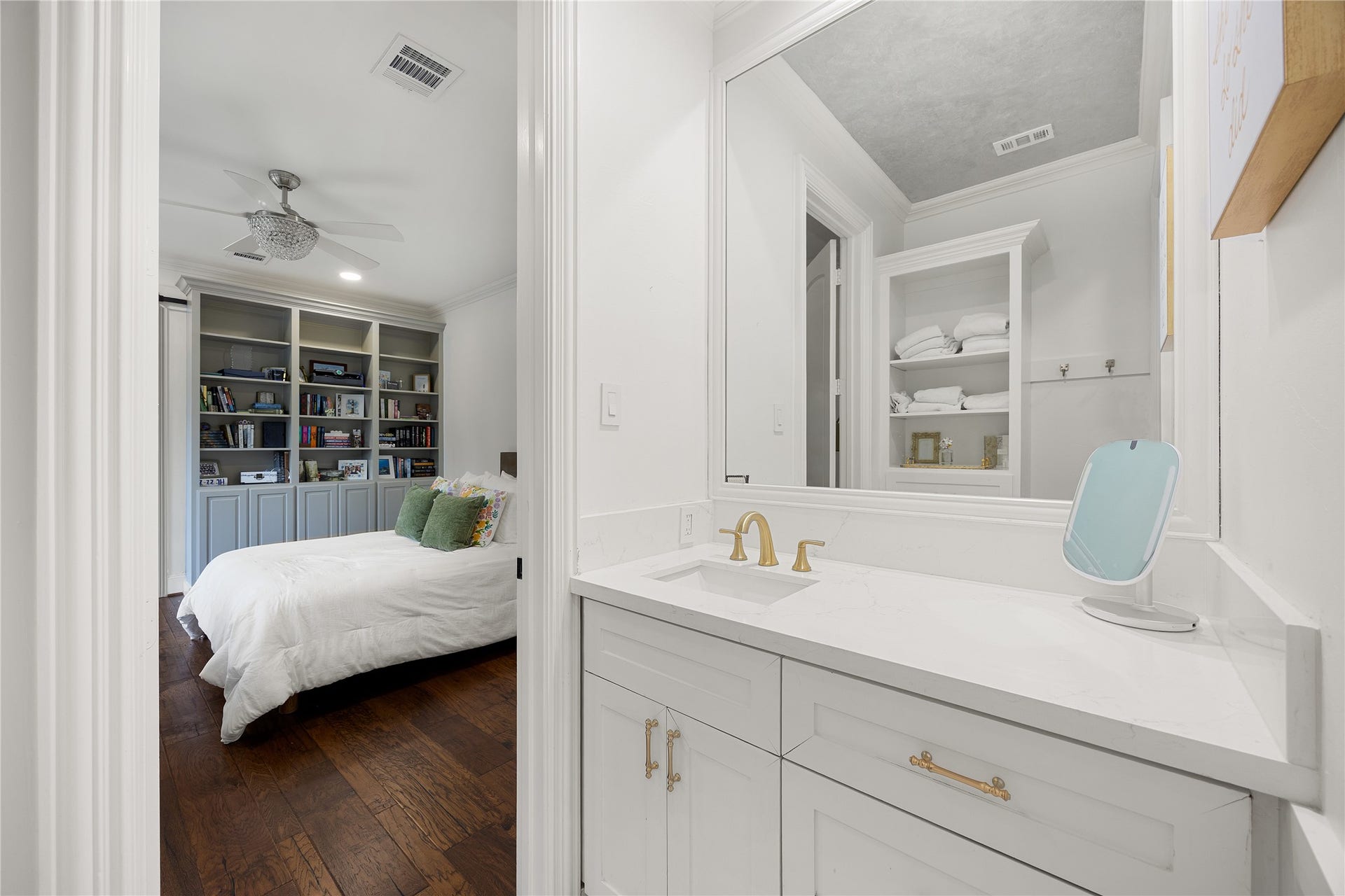 330 E Gaywood Drive, Houston, TX 77079 Ensuite bathroom has a tub/shower combo and a vanity area, with access to the front balcony.