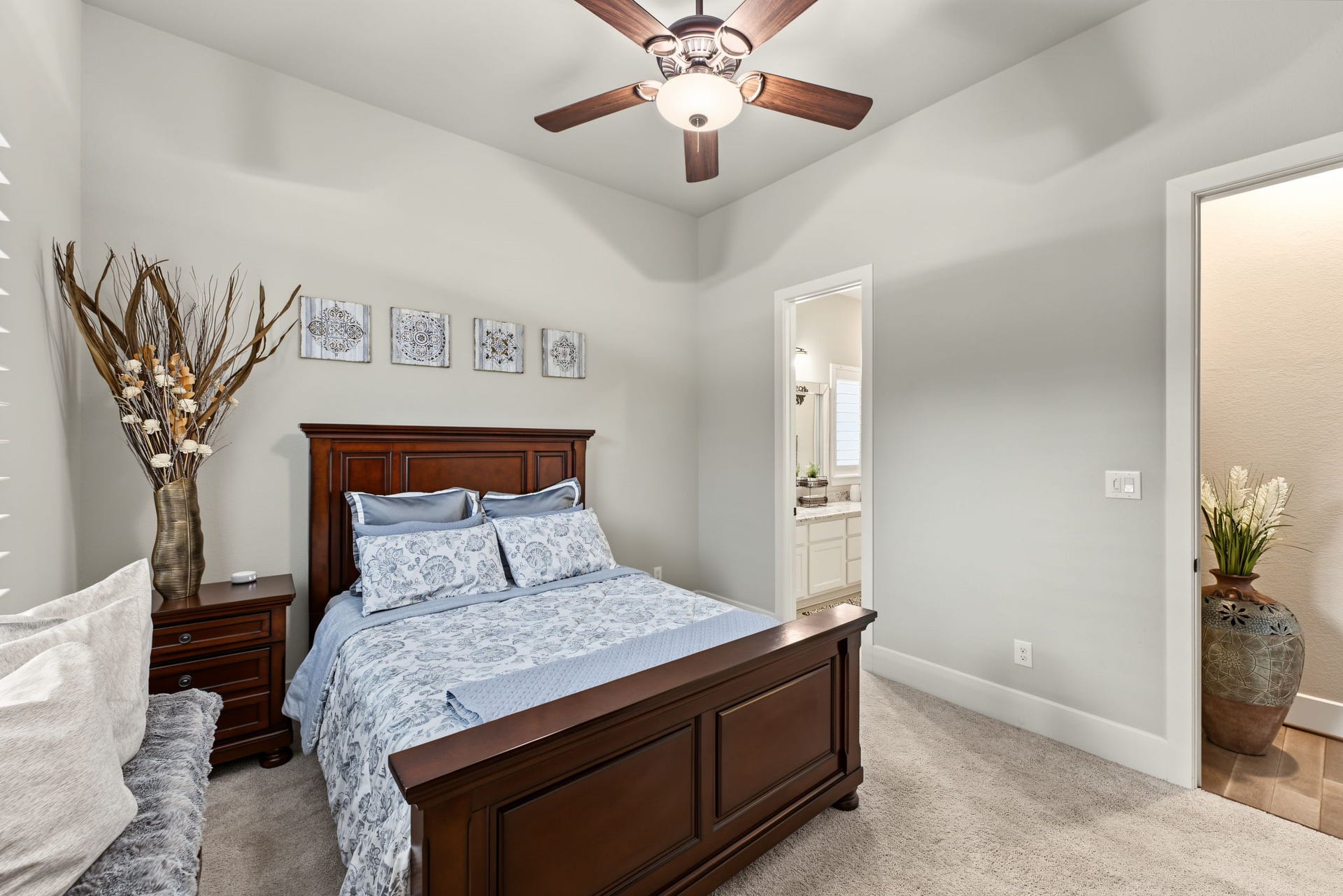 Private Downstairs Secondary Suite! Spacious secondary bedroom featuring its own en-suite bathroom with a granite vanity, beautiful tilework, and a walk-in showerperfect for guests or multigenerational living!