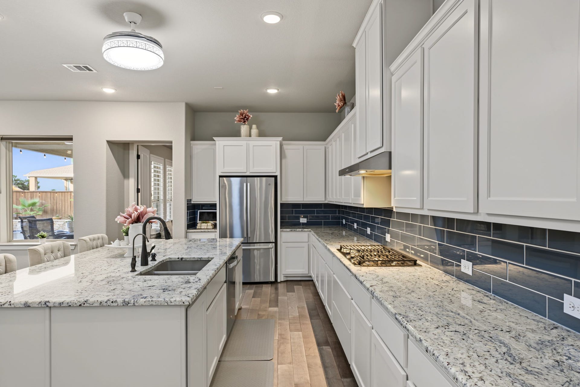 Spacious kitchen offering abundant cabinetry, generous counter space, stainless steel appliances, and a functional layout.