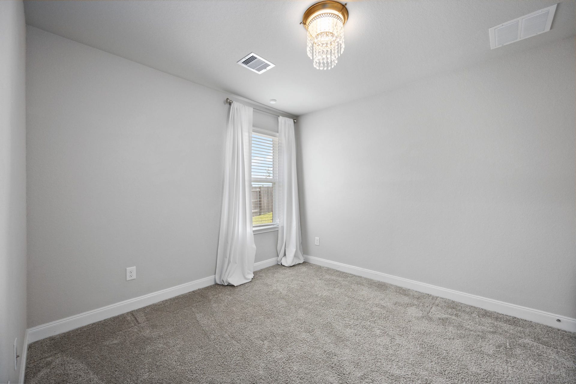 11403 Brookside Arbor Lane, Richmond, TX 77406 The middle bedroom is an oasis, situated in the center of the home for quiet relaxation; lit up with an upgraded crystal light fixture.