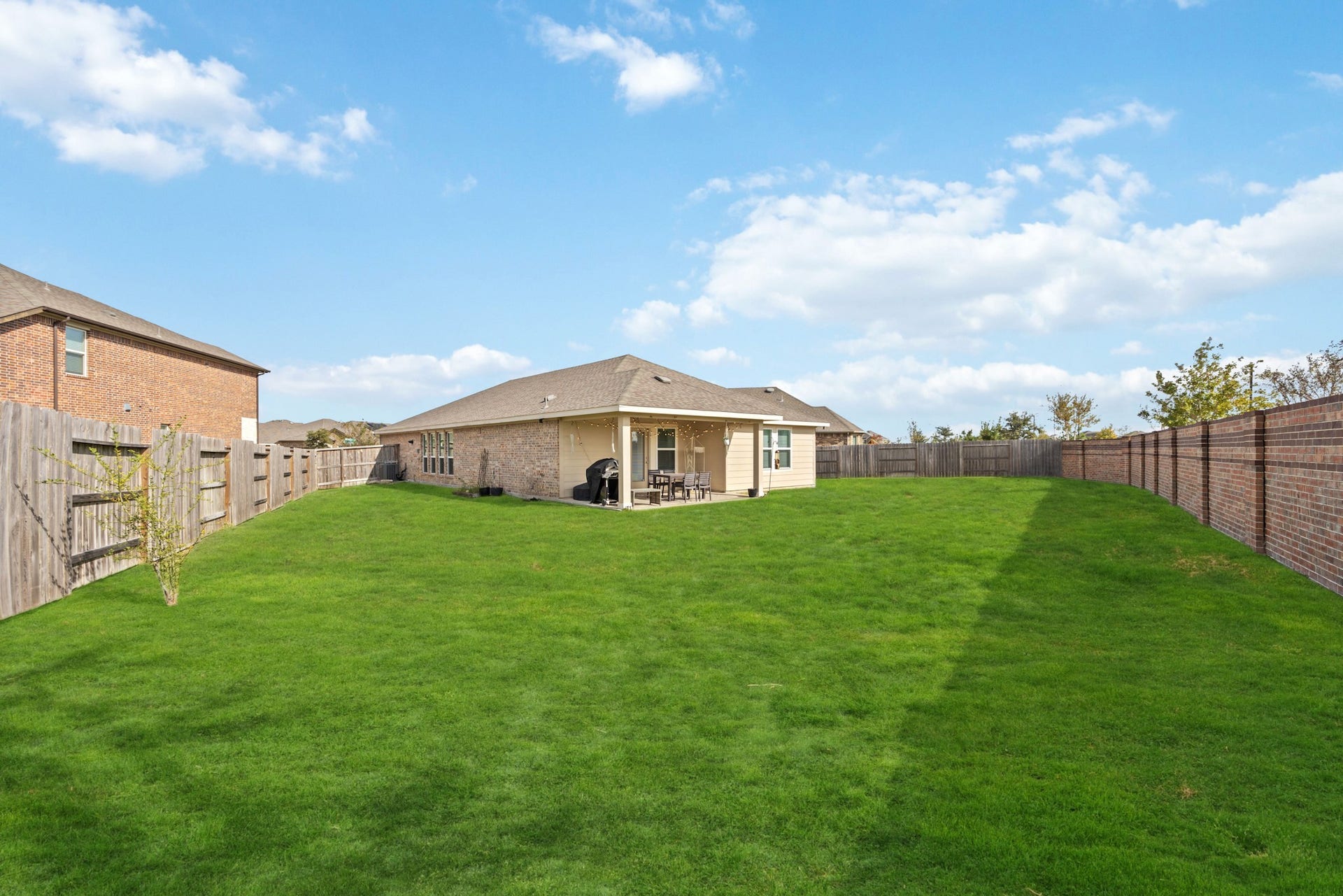 11403 Brookside Arbor Lane, Richmond, TX 77406 Free space for all your backyard dreamsa large yard perfect for play or pets.