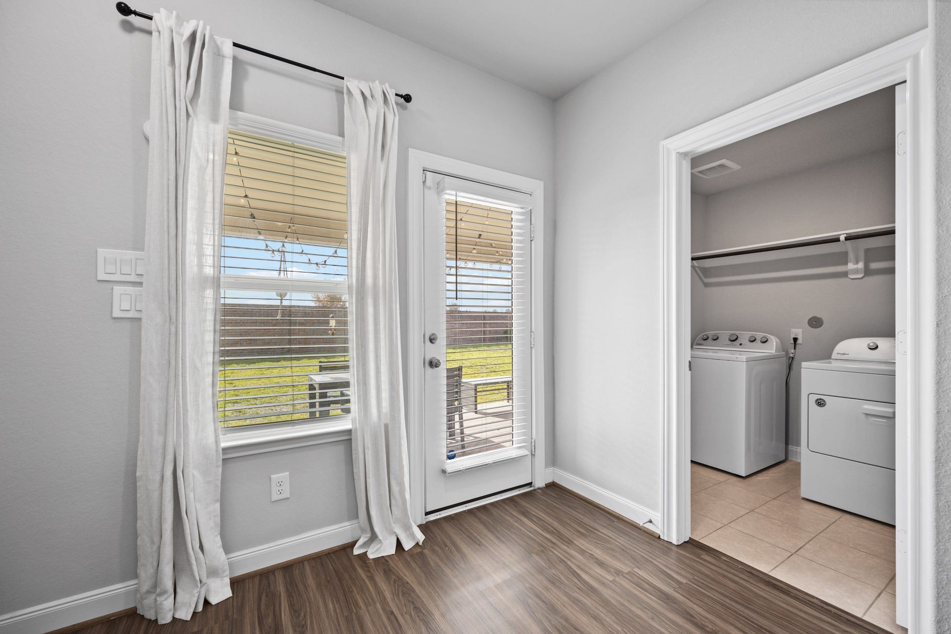 11403 Brookside Arbor Lane, Richmond, TX 77406 All conveniences considered this alcove at the back door offers utility room access, additional storage space, and a pathway to the backyard.