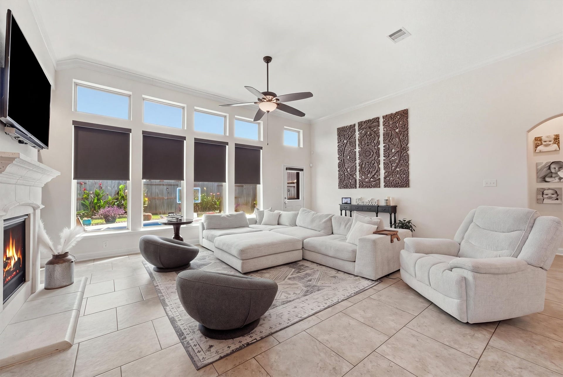 1413 Silver Rings Court, Pearland, TX 77581 Experience the perfect blend of comfort and style in this spacious living area, featuring a gas log fireplace that adds warmth and ambiance to your relaxation.