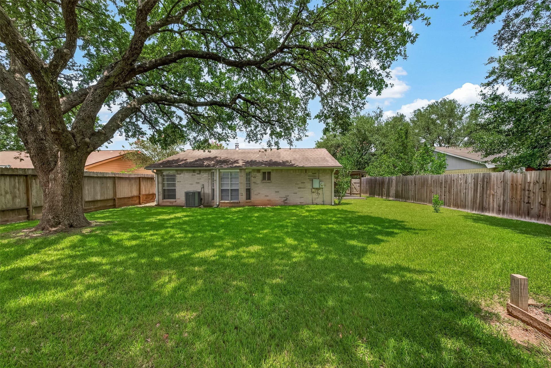 2811 Pheasant Creek Drive, Sugar Land, TX 77498 Rear exterior and oversized backyard.