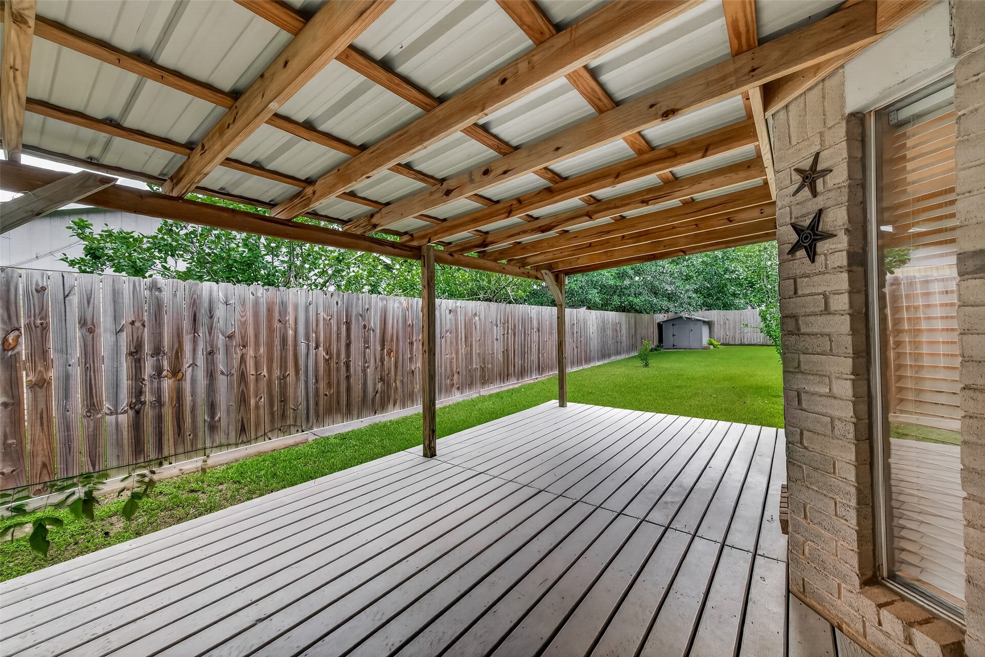 2811 Pheasant Creek Drive, Sugar Land, TX 77498 Alternate view of the large covered outdoor living area.
