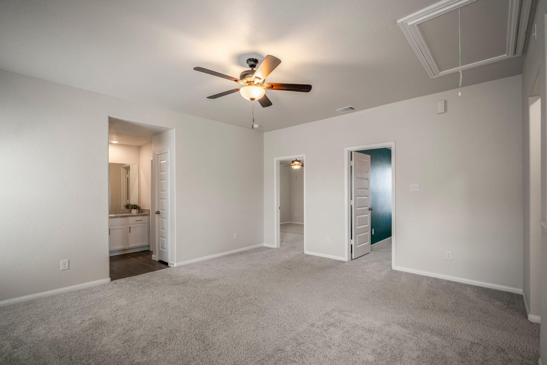 2355 Mount Locke Path, Conroe, TX 77301 Stepping back out of the fourth bedroom brings you into the gameroom once more, with the upstairs full bath positioned just next door at the far end of the room. This central layout keeps the secondary bedrooms, bath and shared living space all conveniently connected.