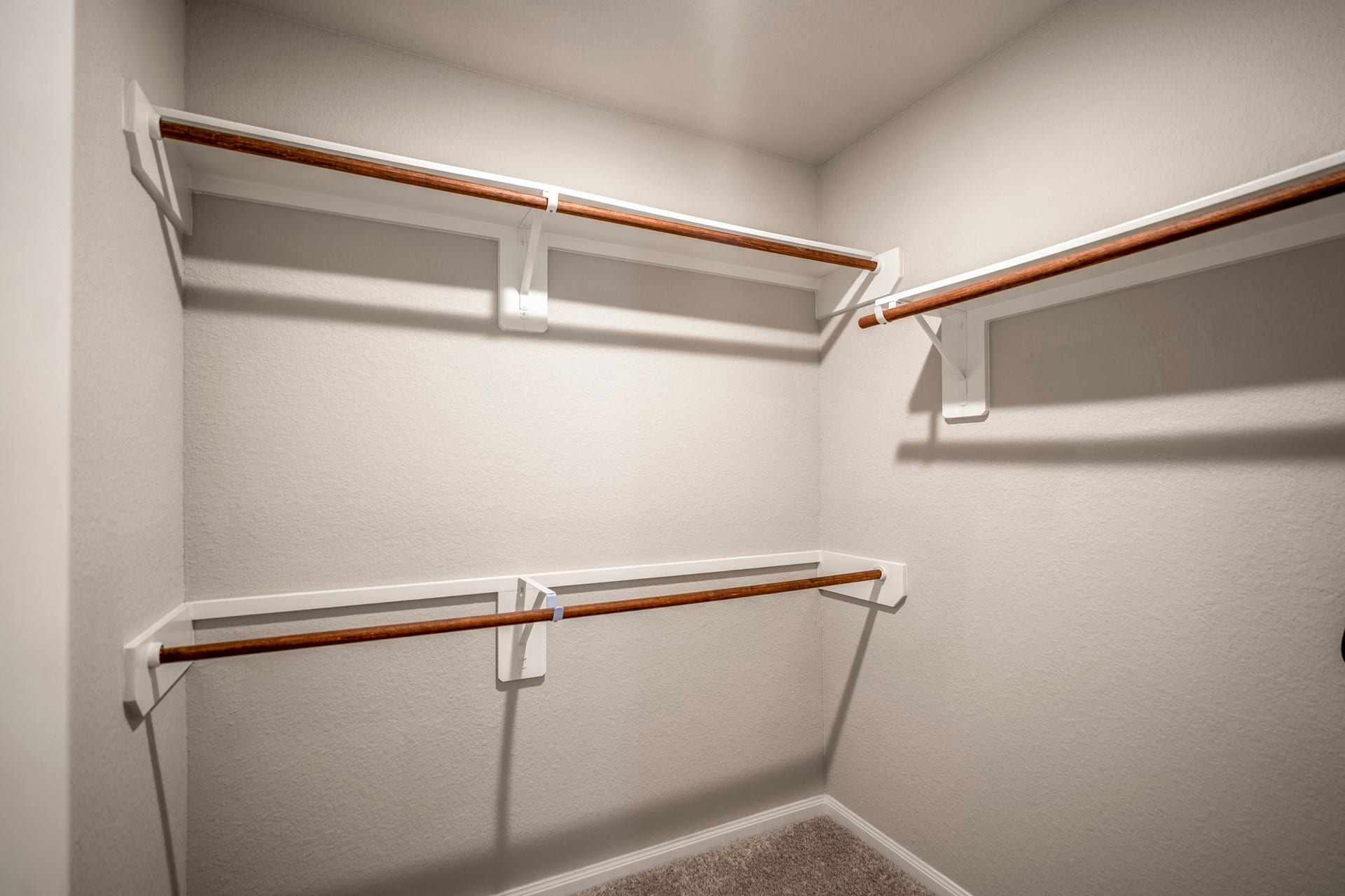 2355 Mount Locke Path, Conroe, TX 77301 And heres one of those standout closets weve been talking aboutthis secondary bedrooms walk-in closet offers an impressive amount of storage, with hanging space wrapping around multiple walls plus upper shelving for even more room to organize.