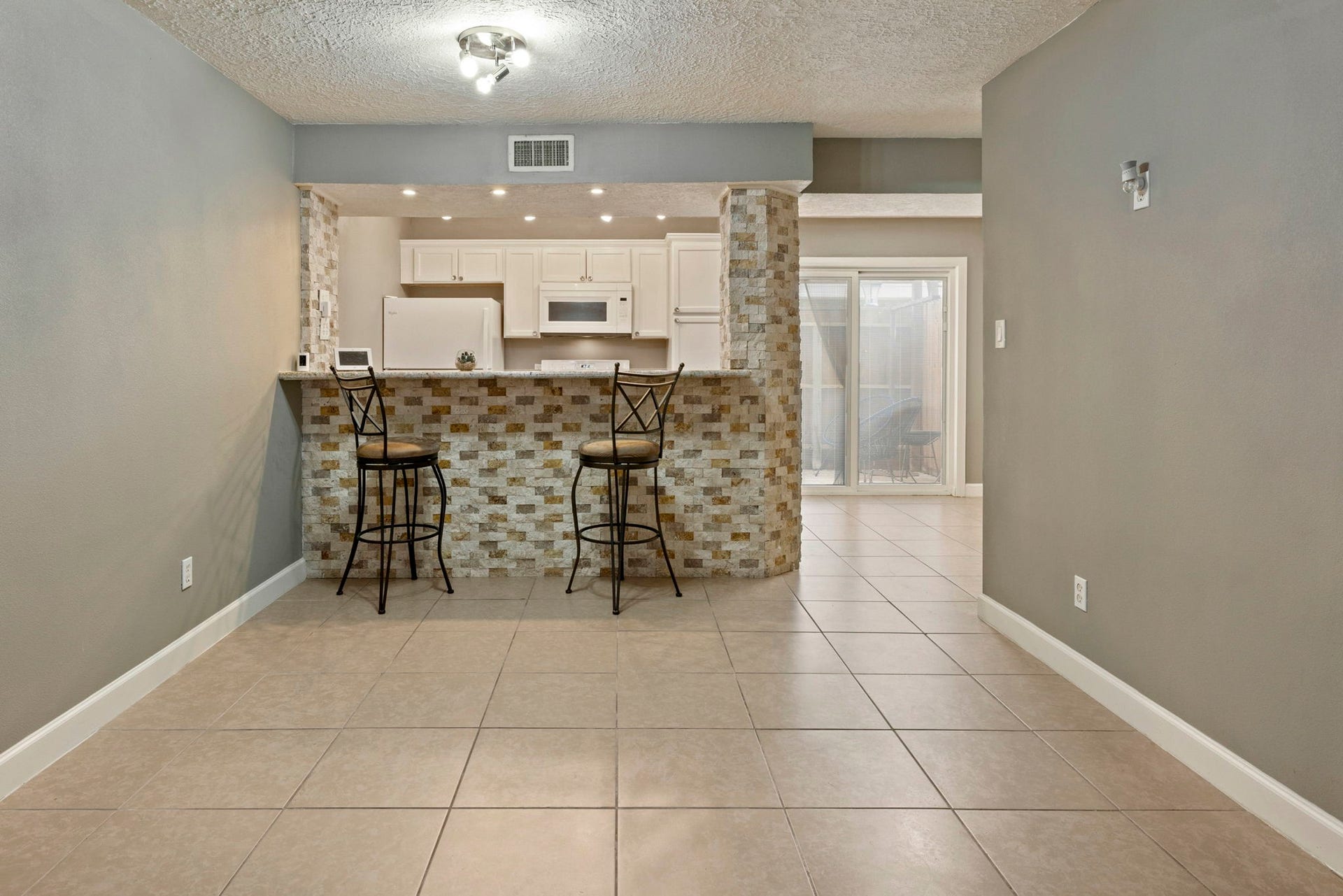 Just beyond the living room is great space for a dining table.