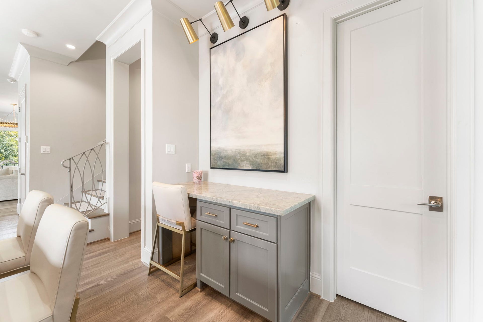 10 Nautical Terrace Way, The Woodlands, TX 77380 Built-in workspace off the kitchen with stone top and generous storage, an organized command center for mail, devices and schedules.