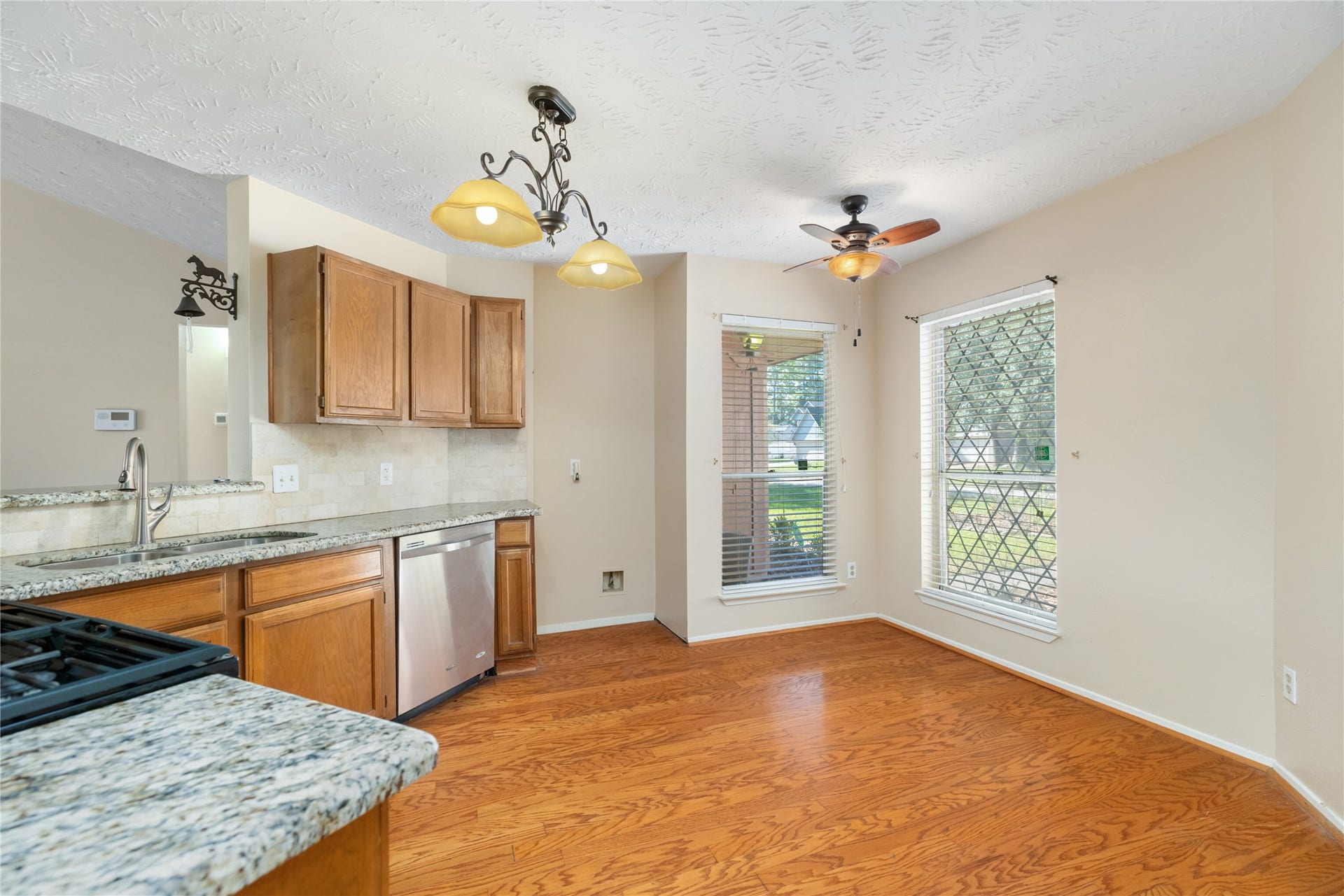 Kitchen showing granite counter tops