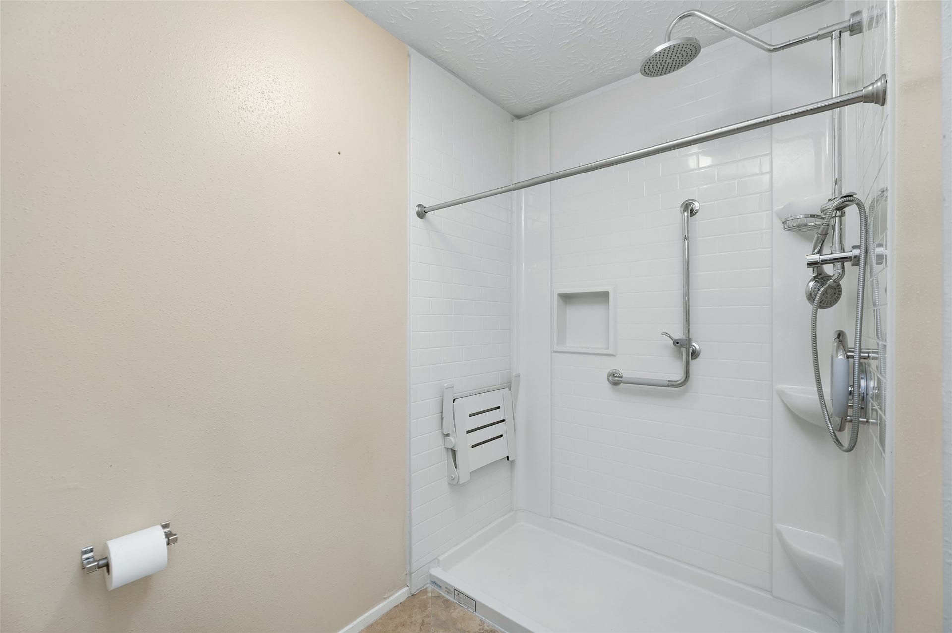 New sit in shower, in primary bedroom