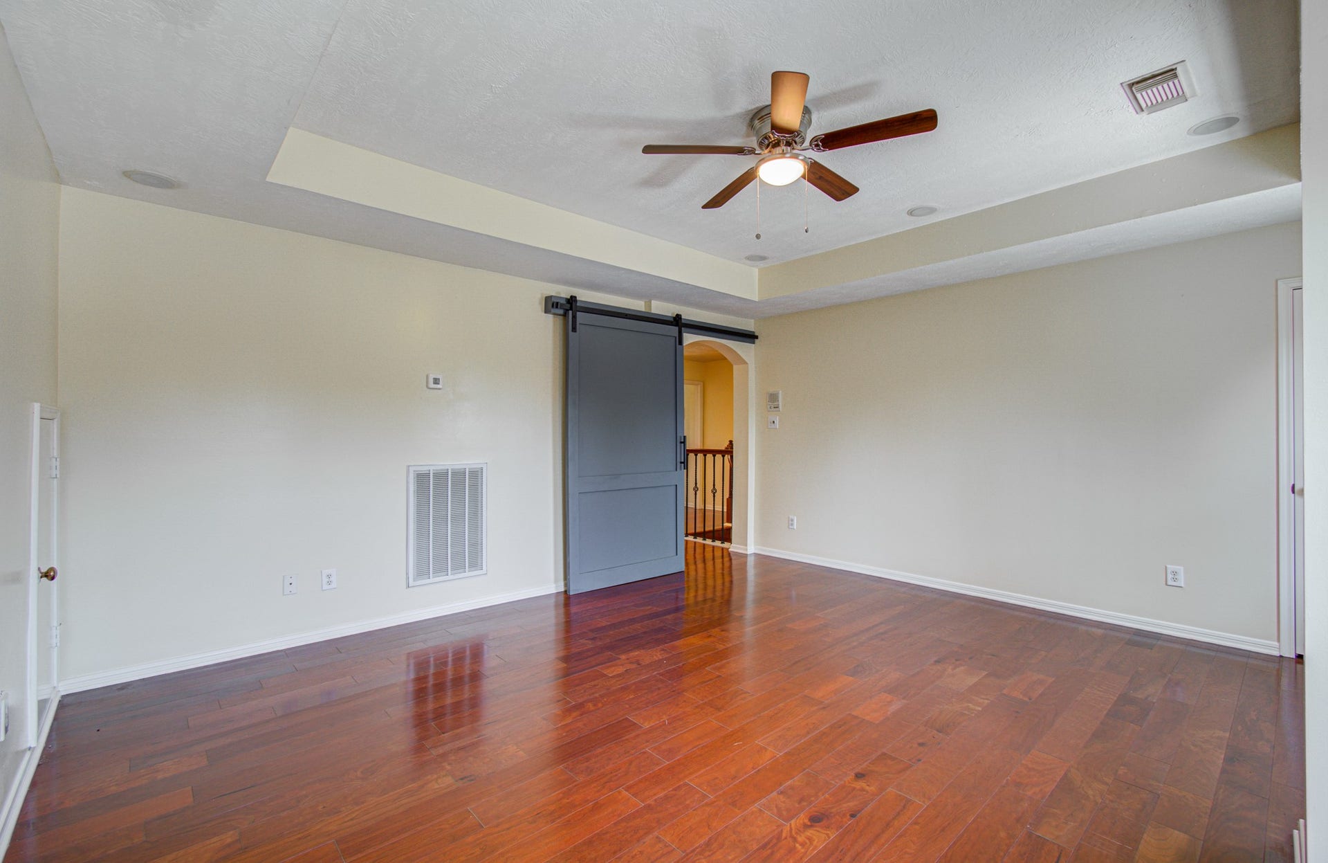 Barn Door on the gameroom to seperate it into a space for all  to enjoy