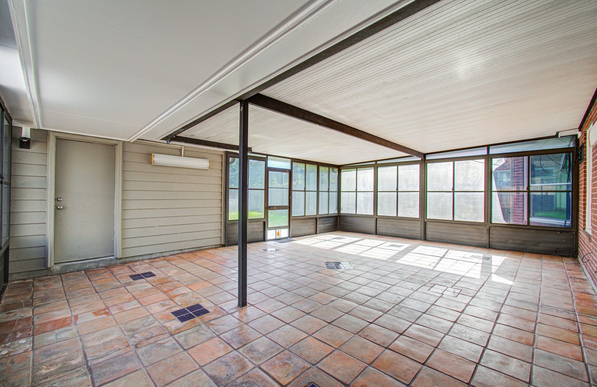 This is the huge 27X 20 Screened Porch attached to the house.  The possibilities for this room are endless