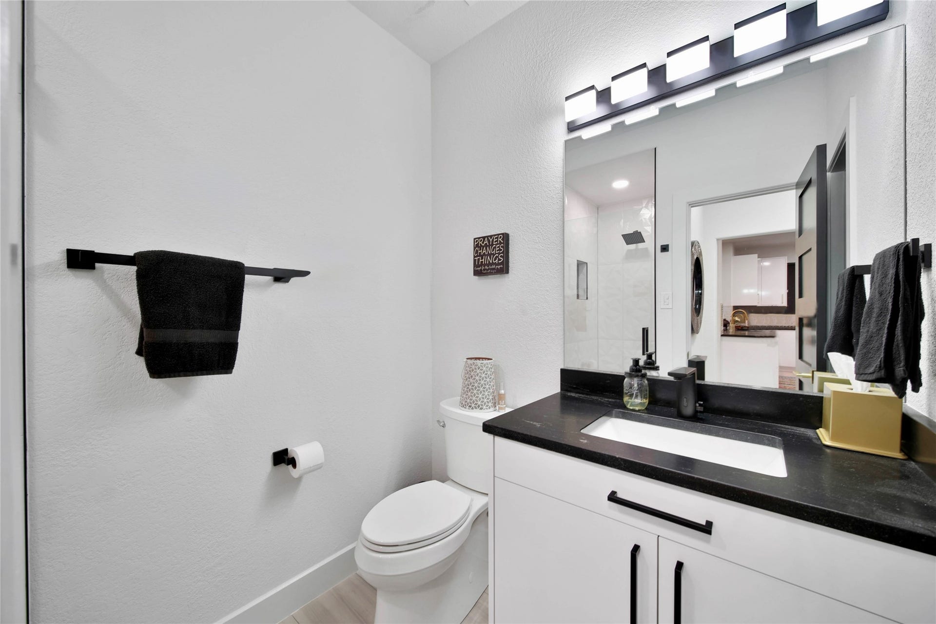 142 Pronghorn Place, Montgomery, TX 77316 Downstairs full bathroom with motion detection faucet to keep things germ free.