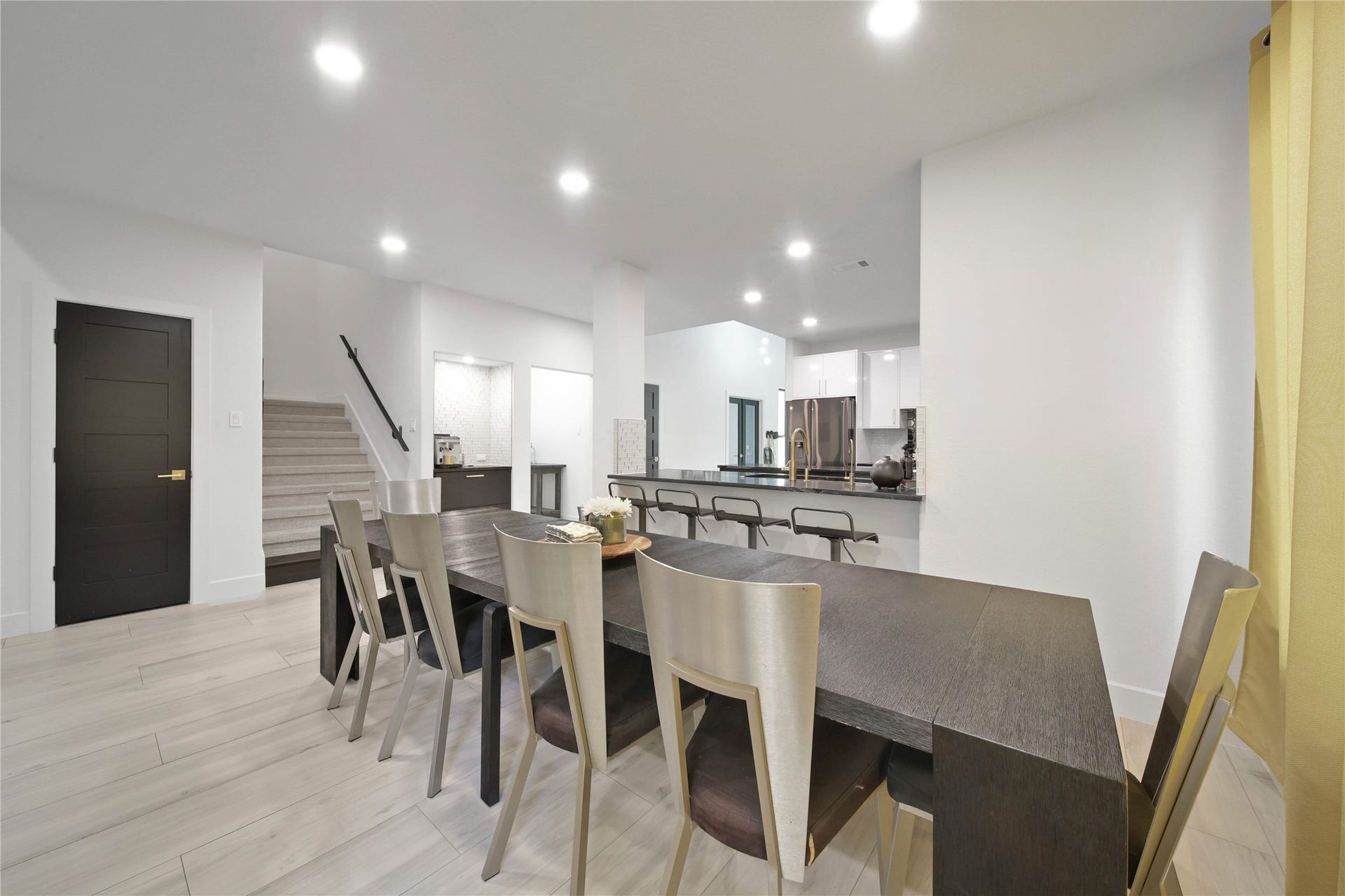142 Pronghorn Place, Montgomery, TX 77316 Breakfast area, large enough for a 10-foot table and bar stools.