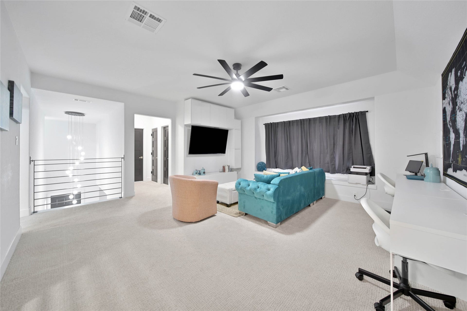 142 Pronghorn Place, Montgomery, TX 77316 Flex space upstairs. Hanging shelves, TV, and curtains stay.