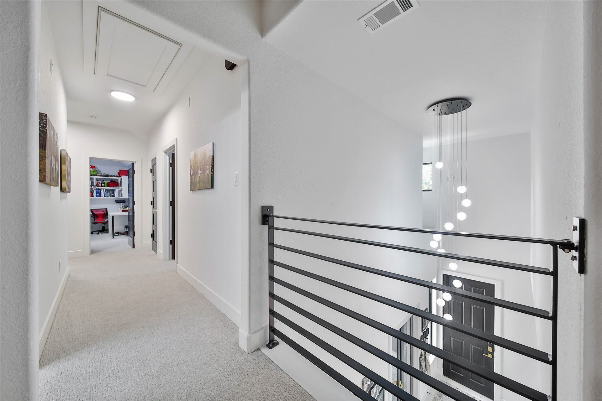 142 Pronghorn Place, Montgomery, TX 77316 Upstairs open to below.