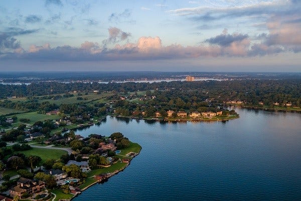 19560 Stripe Hill Bend, Montgomery, TX 77316 Lake Conroe, offering boating, fishing, and lakeside dining.