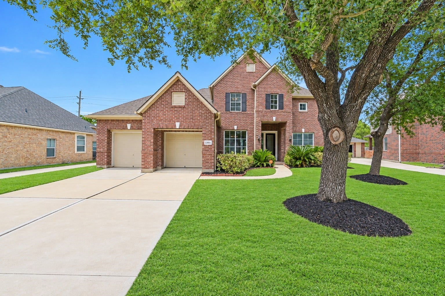 Welcome home to this spacious two-story brick residence in the heart of Shadow Creek Ranch. Mature shade trees, fresh mulch, manicured landscaping, and a welcoming covered entry create outstanding curb appeal, while the three-car tandem garage offers exceptional parking and storage.