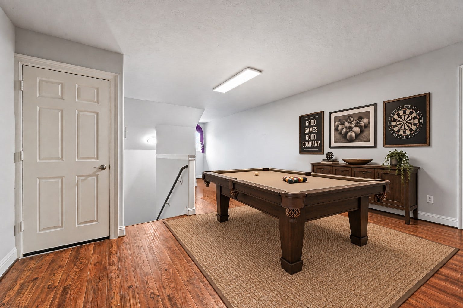 What a versatile upstairs bonus room! Create the ultimate Man Cave, game room, media room or easily transform the space into an additional bedroom to fit your needs. So many possibilities in this amazing custom home! Photo is Virtually Staged.