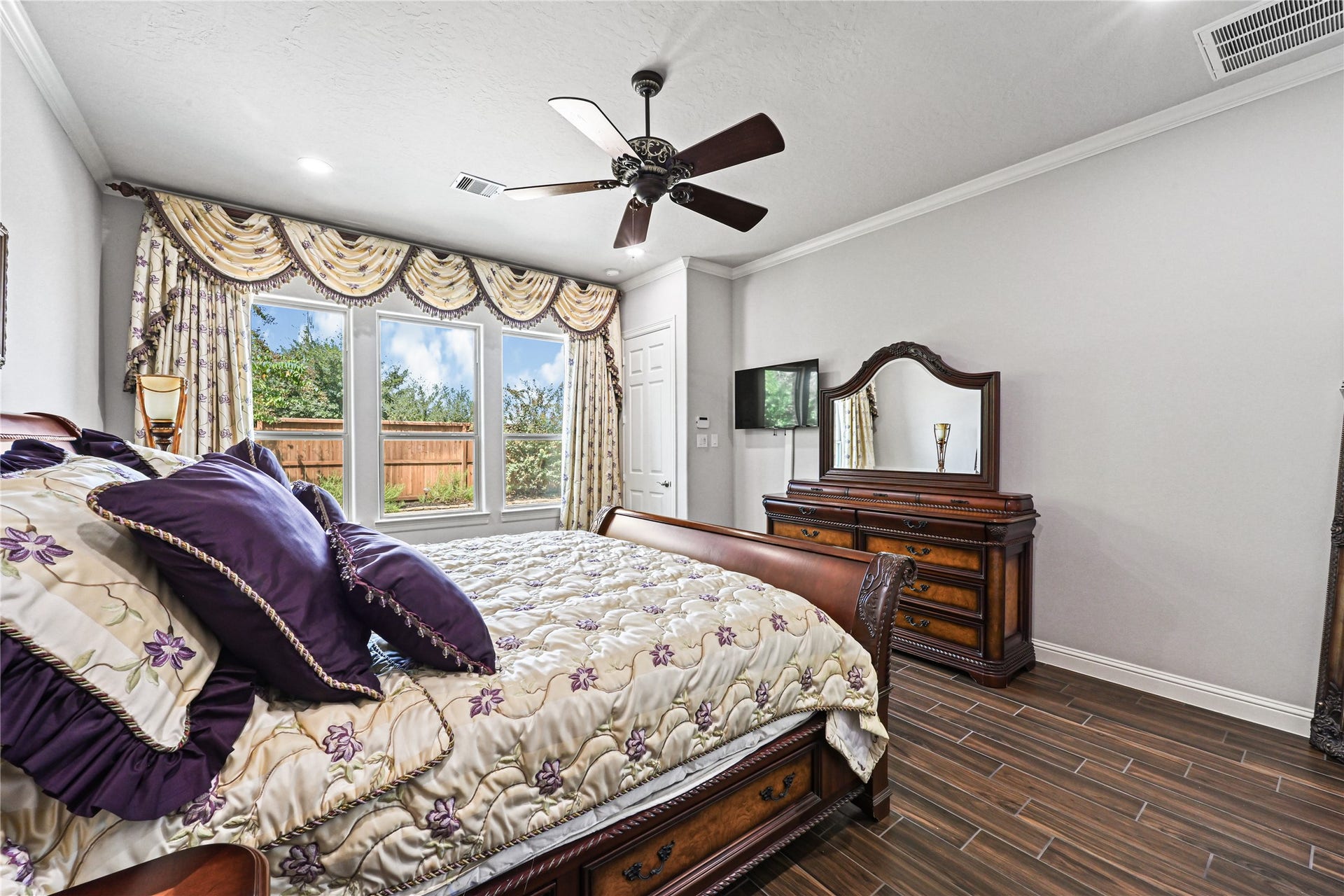 Wake up to a beautiful view every day! The luxurious primary suite features a stunning wall of windows overlooking your private backyard oasis & sparkling custom pool. Natural light, peaceful views & your own private retreatwhat an amazing place to come home to!