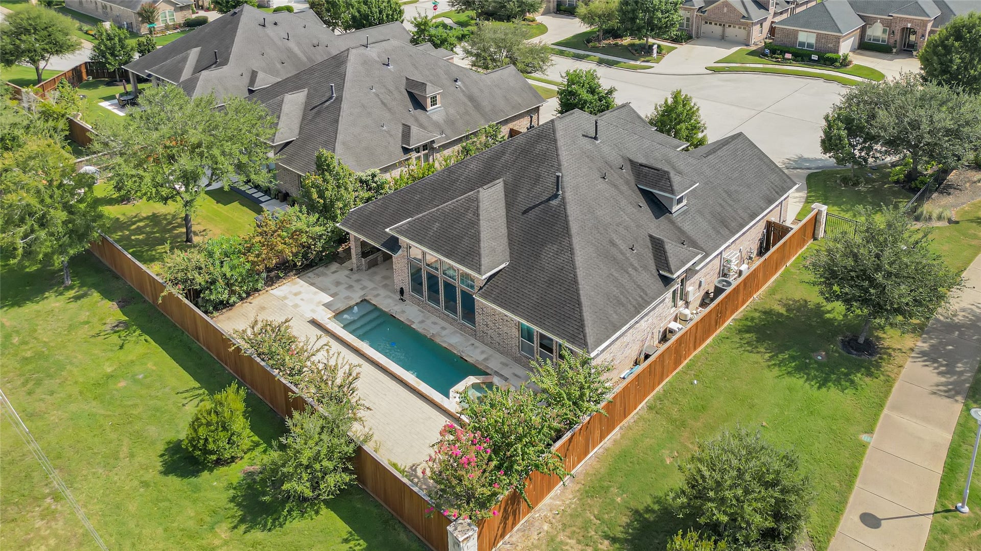 Stunning custom Mediterranean one-story with game room up, perfectly situated on a quiet cul-de-sac in Towne Lakes sought-after active adult community! This beautiful all-brick home offers your own private backyard oasis featuring a sparkling custom pool & spa surrounded by gorgeous travertine tile, an outdoor kitchen, fruit trees & a walking trail just beyond the backyard! HOA-maintained front yard adds to the carefree lifestyle. Designed for relaxing and entertaining!