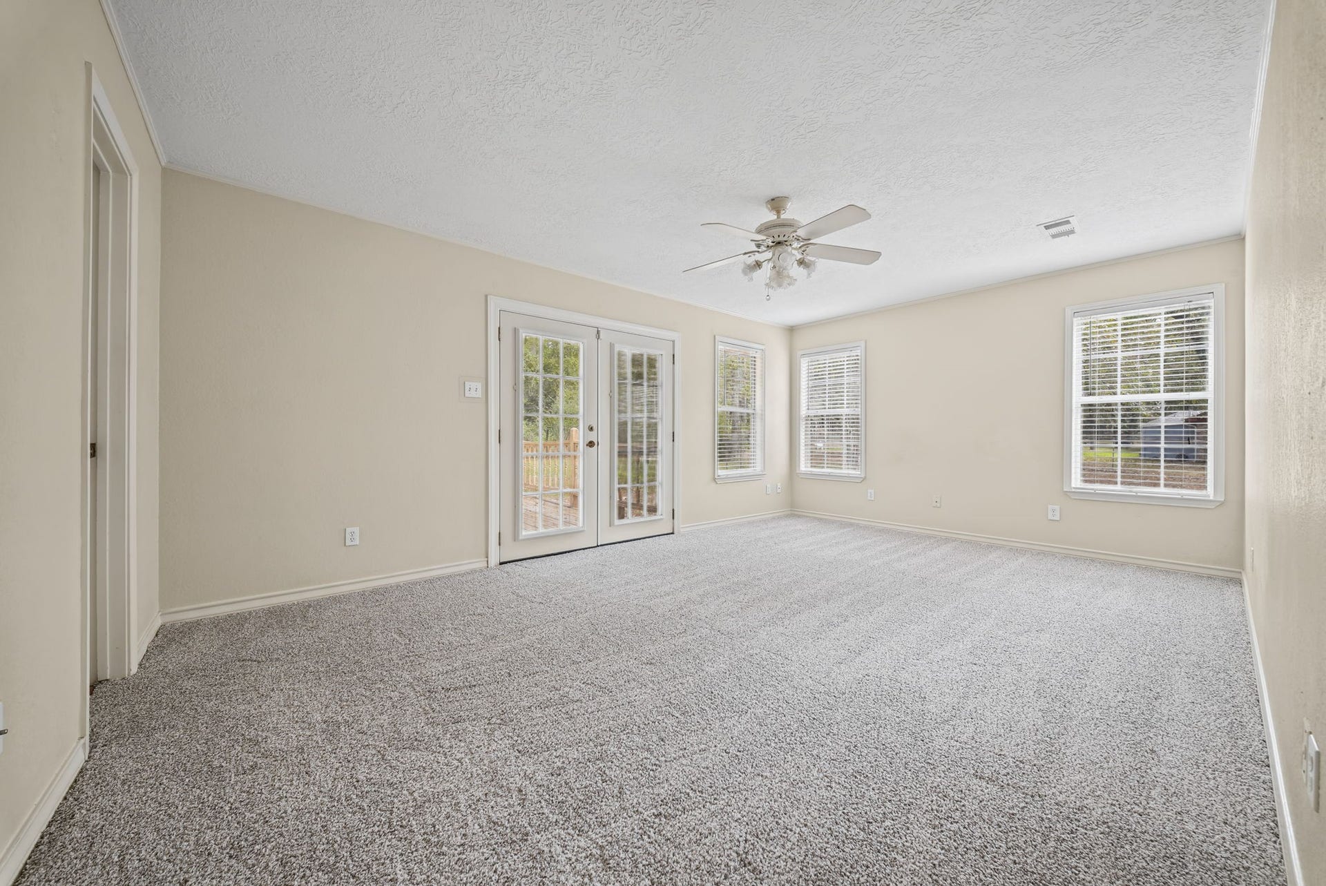 Primary with access to back patio.