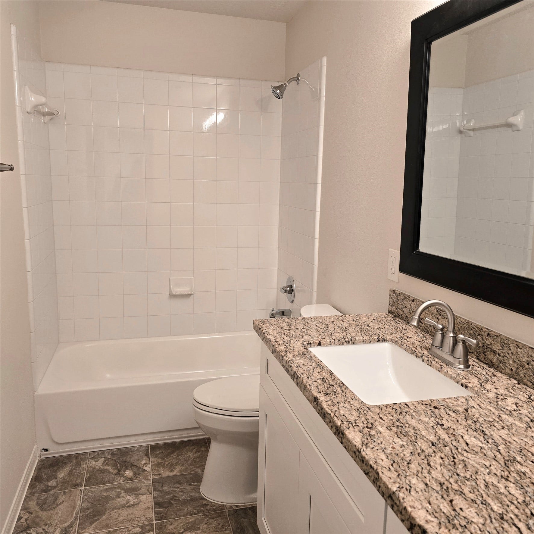 12006 Audubon Hill Court, Houston, TX 77038 2nd bathroom. Updated with granite countertop and under-counter sink.