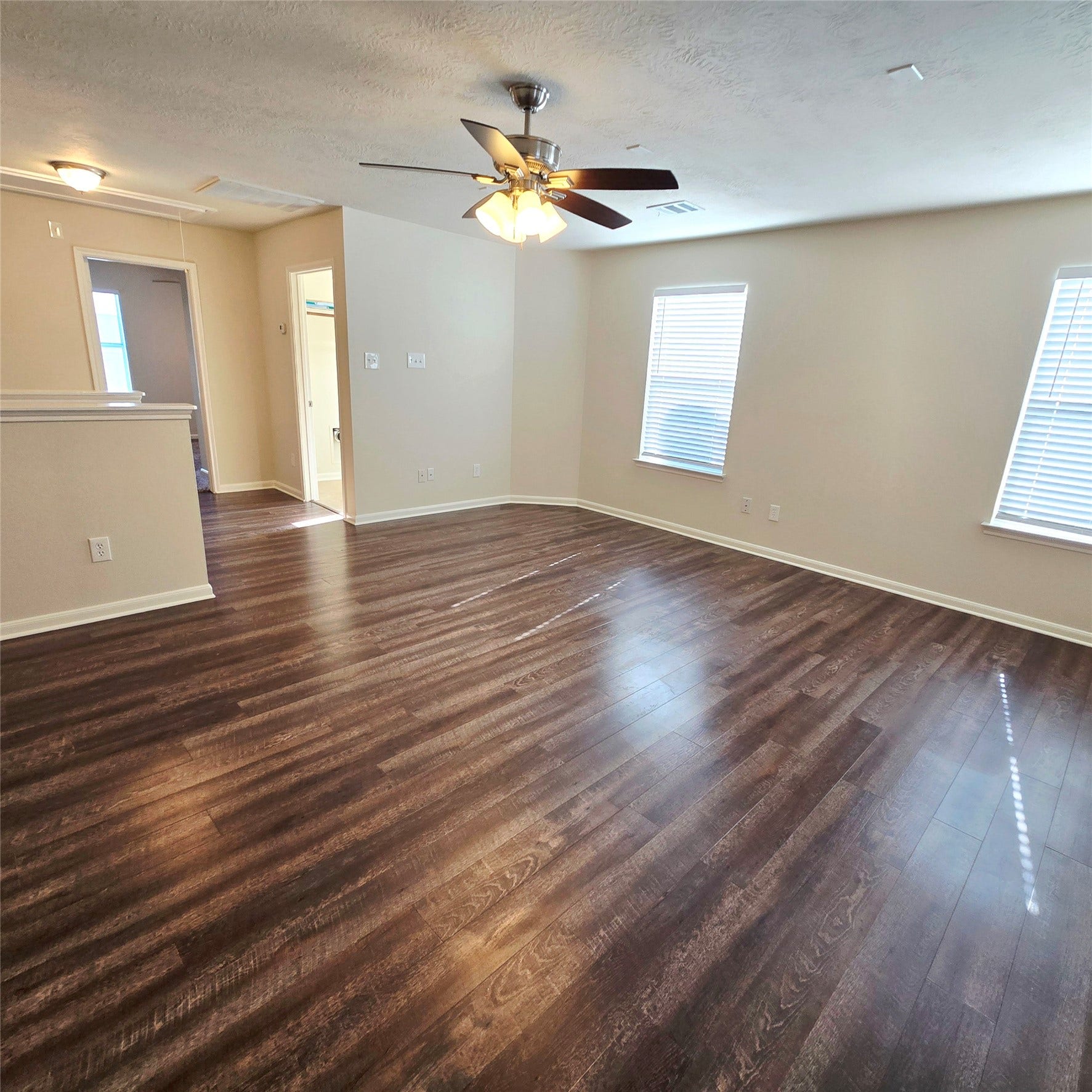 12006 Audubon Hill Court, Houston, TX 77038 Den with lots of natural light.