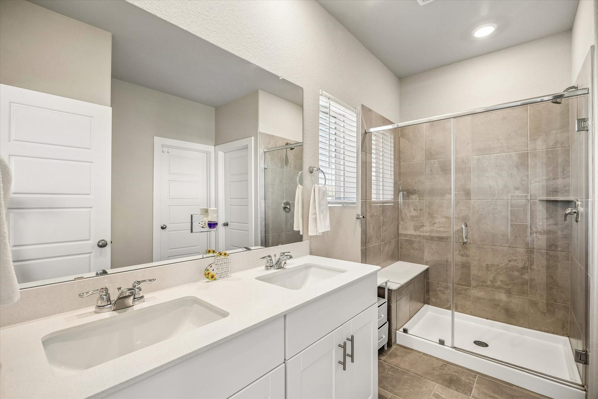 14838 Silent Gulf Avenue, Houston, TX 77082 Private primary bathroom offers a dedicated place to refresh and rejuvenate, bringing comfort and convenience to your morning and evening routines.