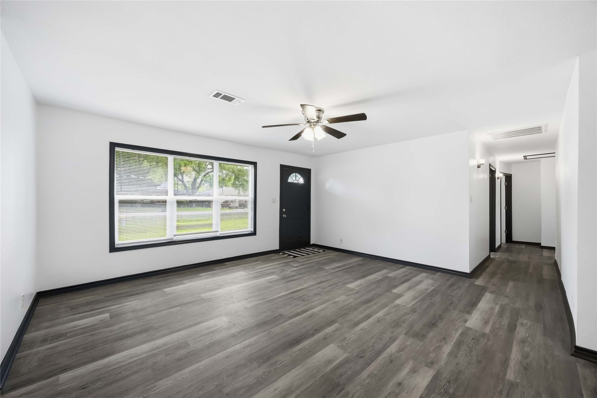 9723 Oldcrest Drive, Stafford, TX 77477 Just inside the front door, new flooring greets you throughout. New paint, new windows.