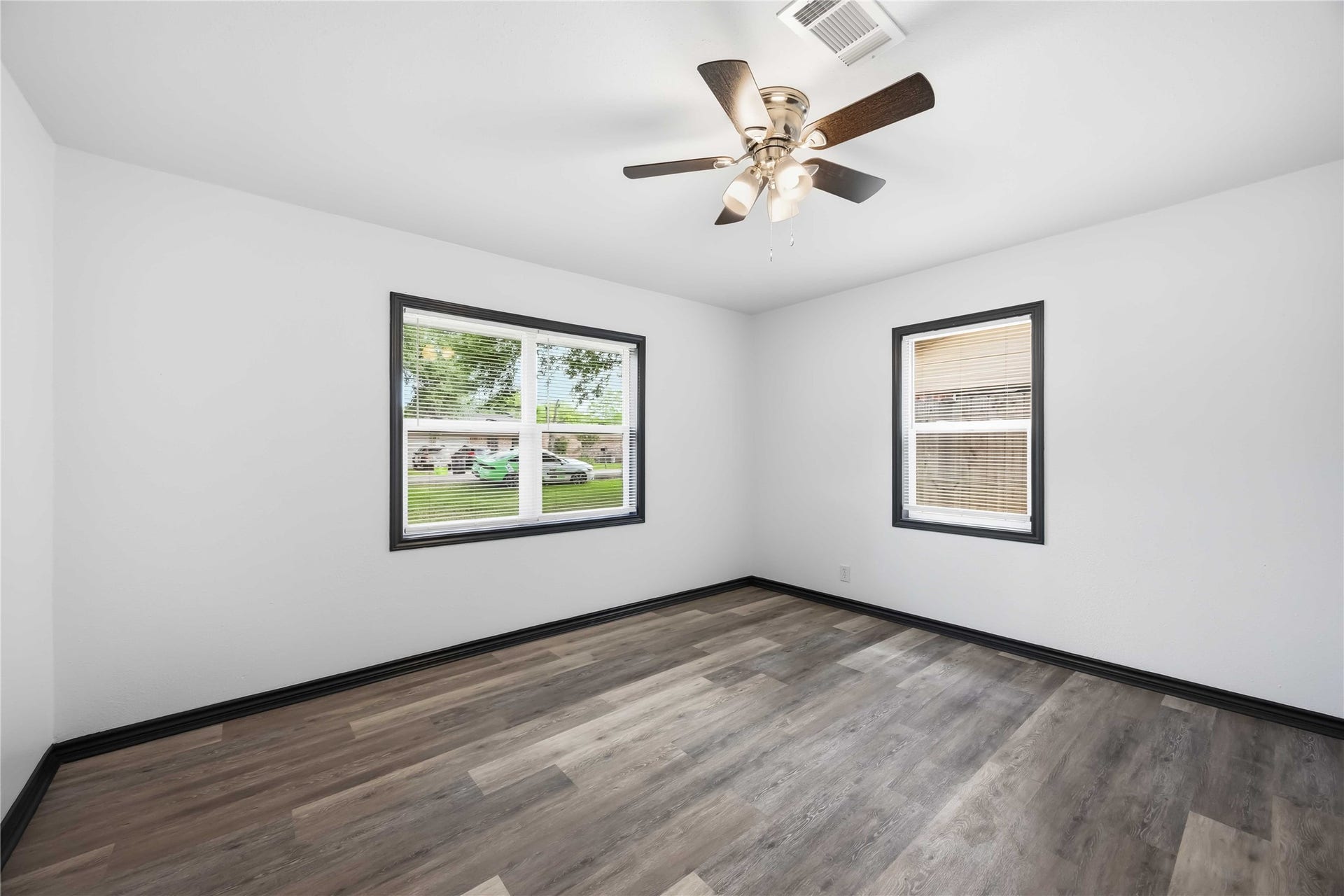 9723 Oldcrest Drive, Stafford, TX 77477 Secondary bedroom facing the front yard.