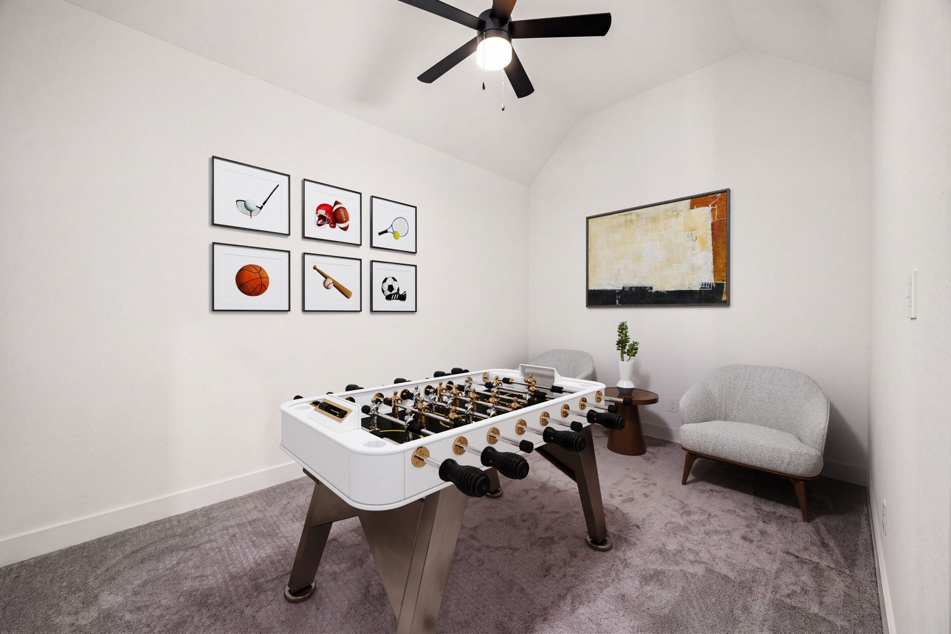 31322 Crescent Hill Drive, Fulshear, TX 77441 The perfect flexible game or media room. Plush neutral carpeting grounds this versatile entertainment space, highlighted by soaring vaulted ceilings and a modern multi-blade ceiling fan with integrated lighting.