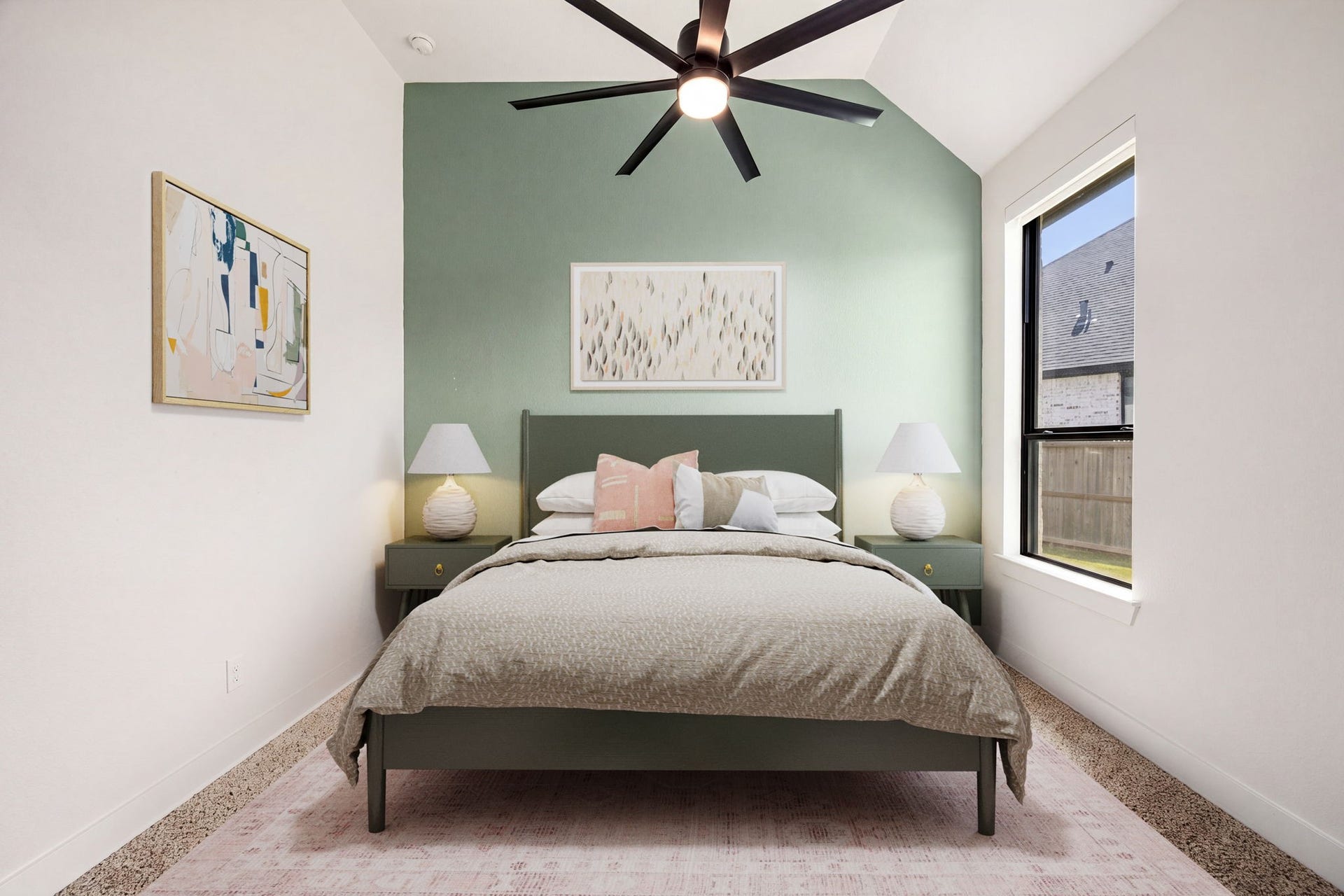 31322 Crescent Hill Drive, Fulshear, TX 77441 A stylish bedroom with custom details. A soft sage green accent wall serves as a beautiful backdrop, complemented by a dramatic vaulted ceiling, a black-trimmed vertical window, blackout shades, wide-plank flooring, and a modern multi-blade ceiling fan.