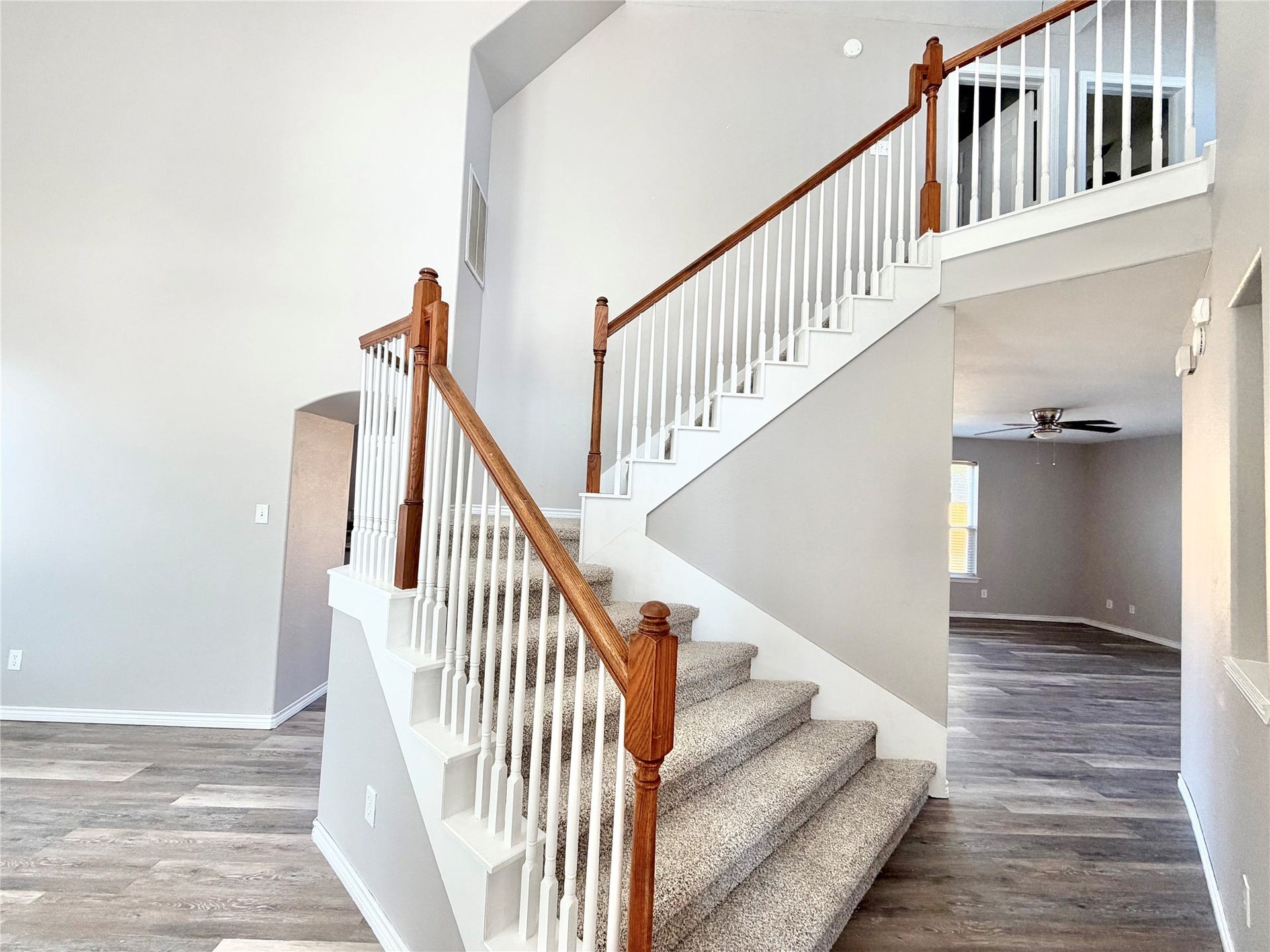 7818 Red Oak Lane, Texas City, TX 77591 Stately grand staircase is just waiting for family pictures! New carpet there as well.