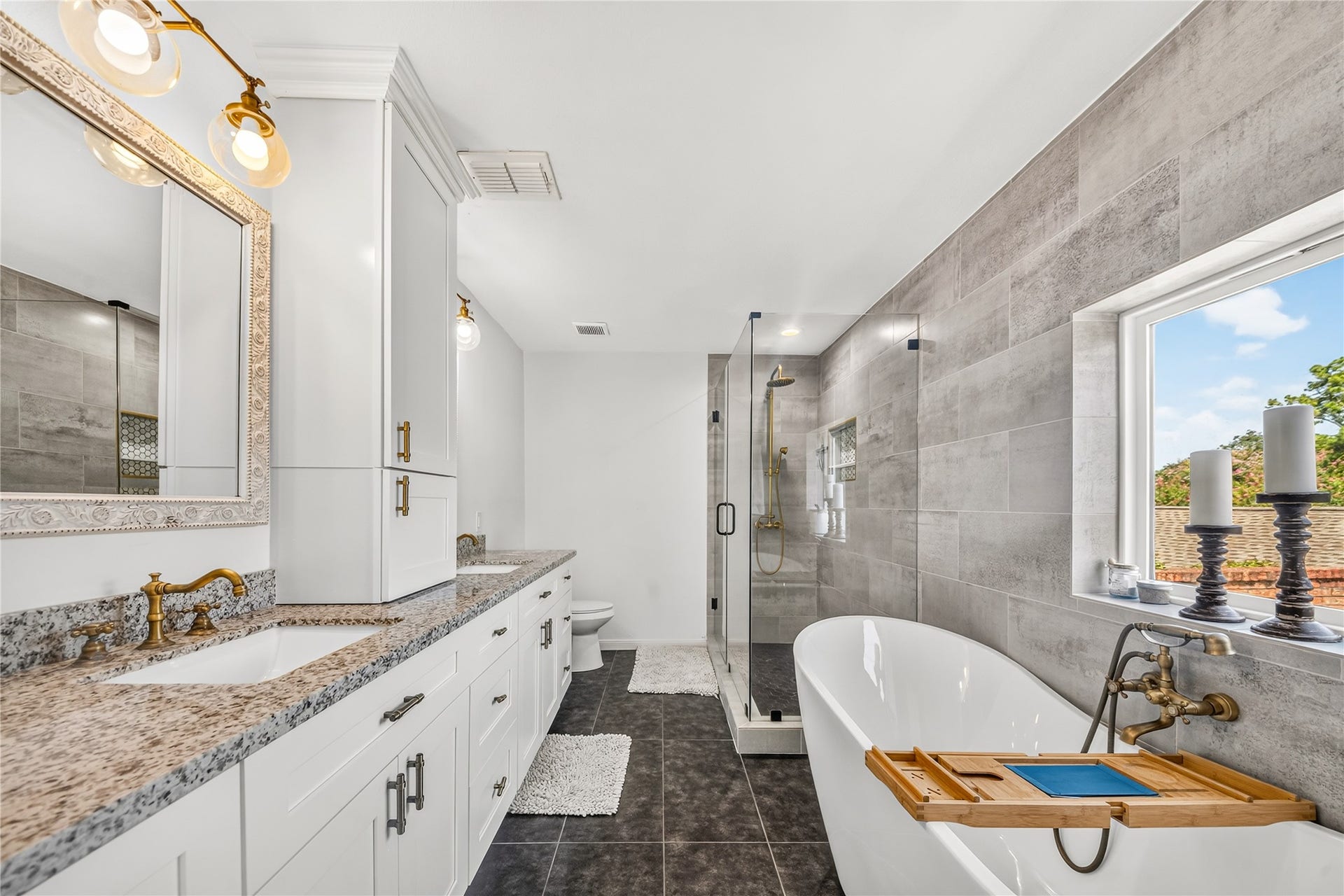 444 E Fair Harbor Lane, Houston, TX 77079 Step into a spa-inspired primary bathroom designed for both comfort and style