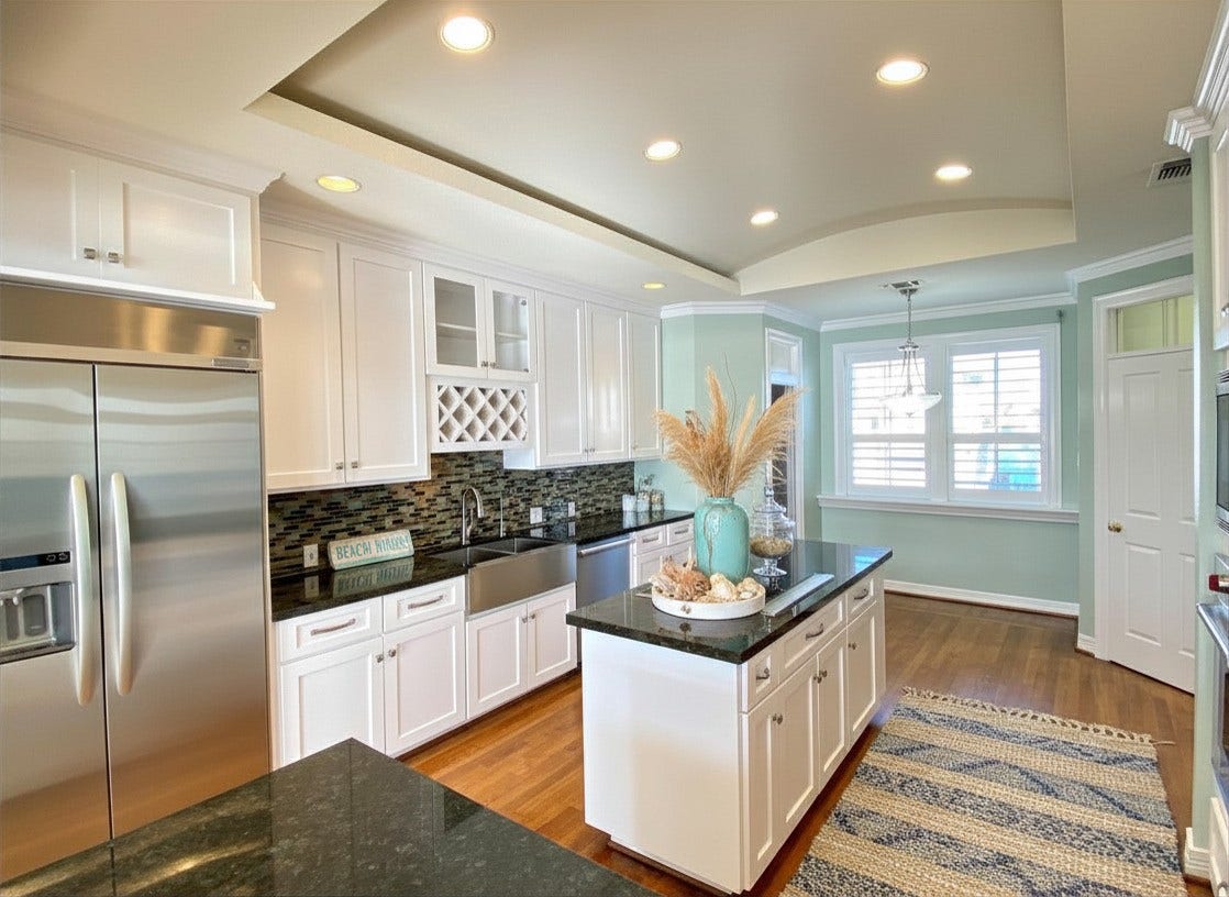 919 Long Reach Drive, Tiki Island, TX 77554 Virtual staging done to highlight the island prep space.