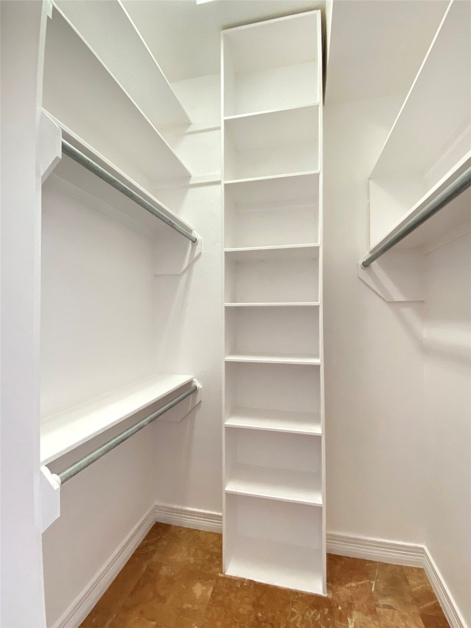 919 Long Reach Drive, Tiki Island, TX 77554 One of two matching closet spaces for the primary bedroom.