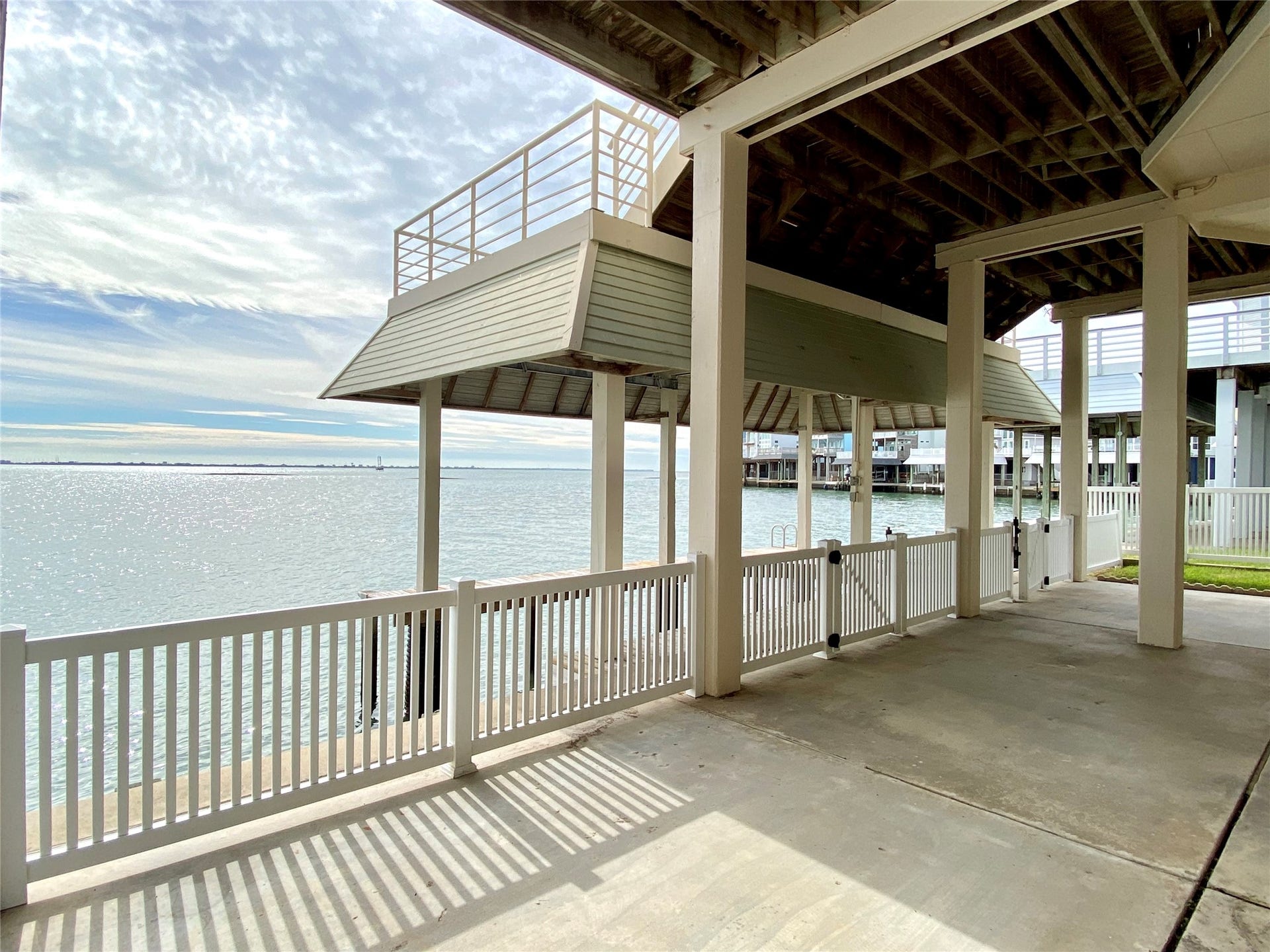 919 Long Reach Drive, Tiki Island, TX 77554 Bay view with boat house.