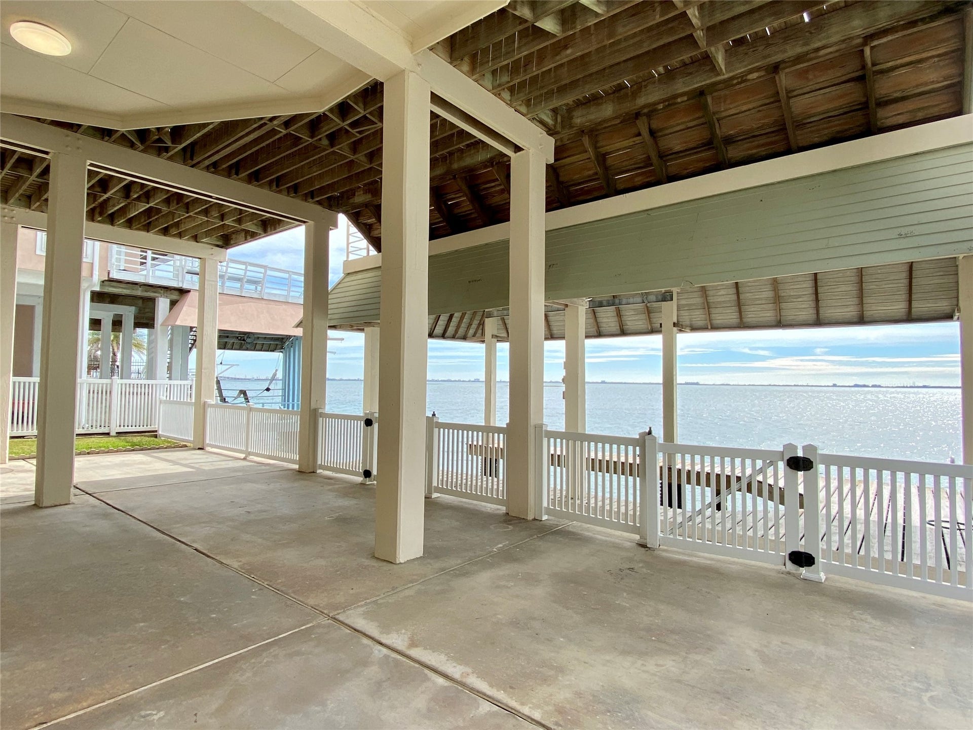 919 Long Reach Drive, Tiki Island, TX 77554 View from under the house. A great, shady space when coming off a day on the bay.
