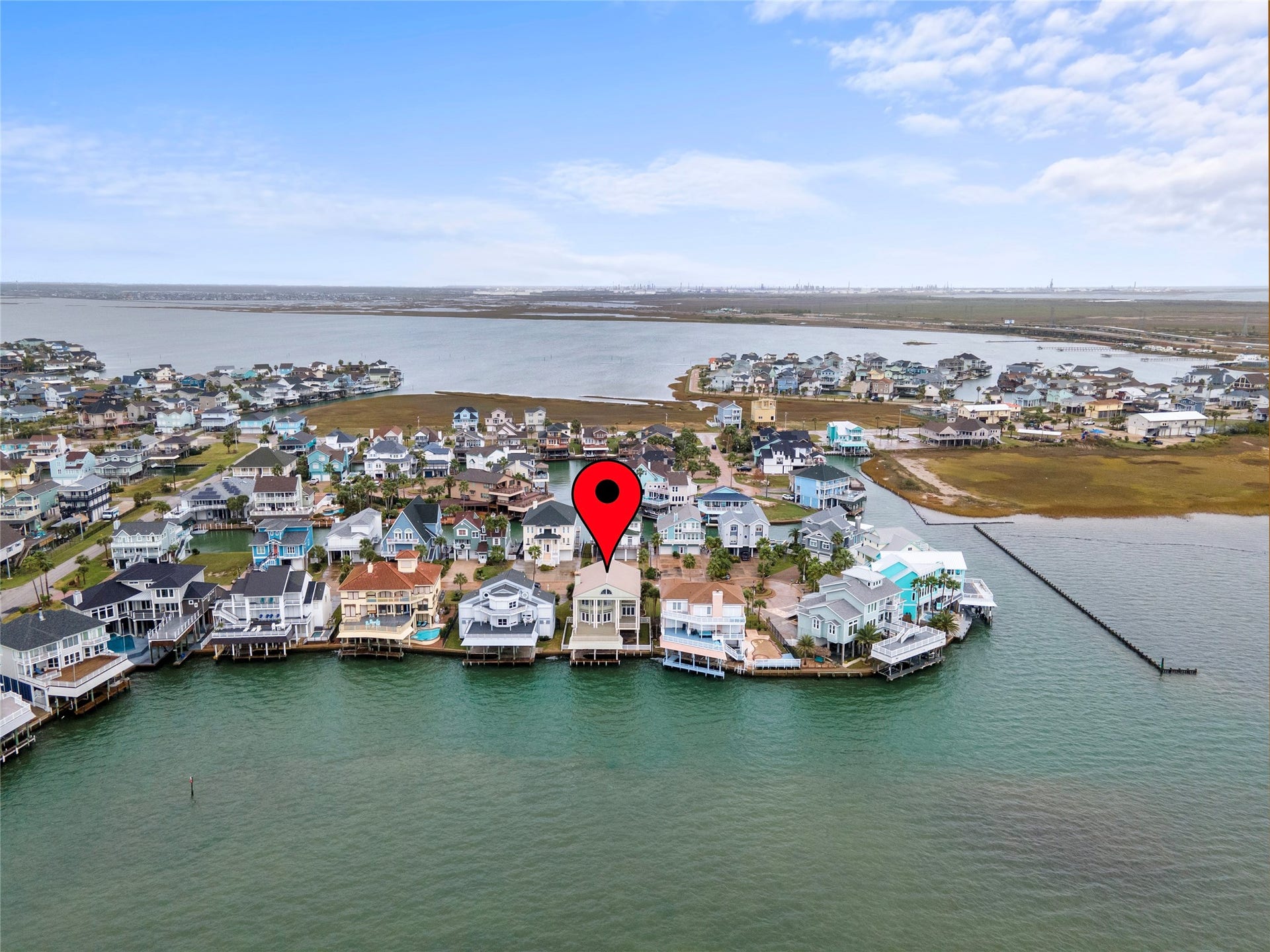 919 Long Reach Drive, Tiki Island, TX 77554 Located on the south side of Tiki with stunning views of the bay.